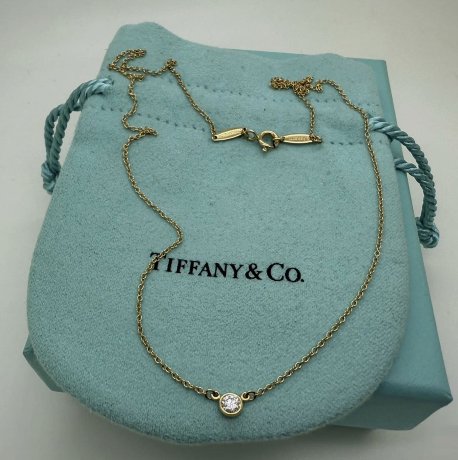 Tiffany Co 18k Yellow Gold Elsa Peretti Diamond by the Yard Necklace 16" With Orig Box: Tiffany Co 18k Yellow Gold Elsa Peretti Diamond by the Yard Necklace 16" With Orig Box. Tiffany Co 18k yellow gold Elsa Peretti Diamond by the Yard Necklace 16"Length: 16"Diamond size: approximately 0