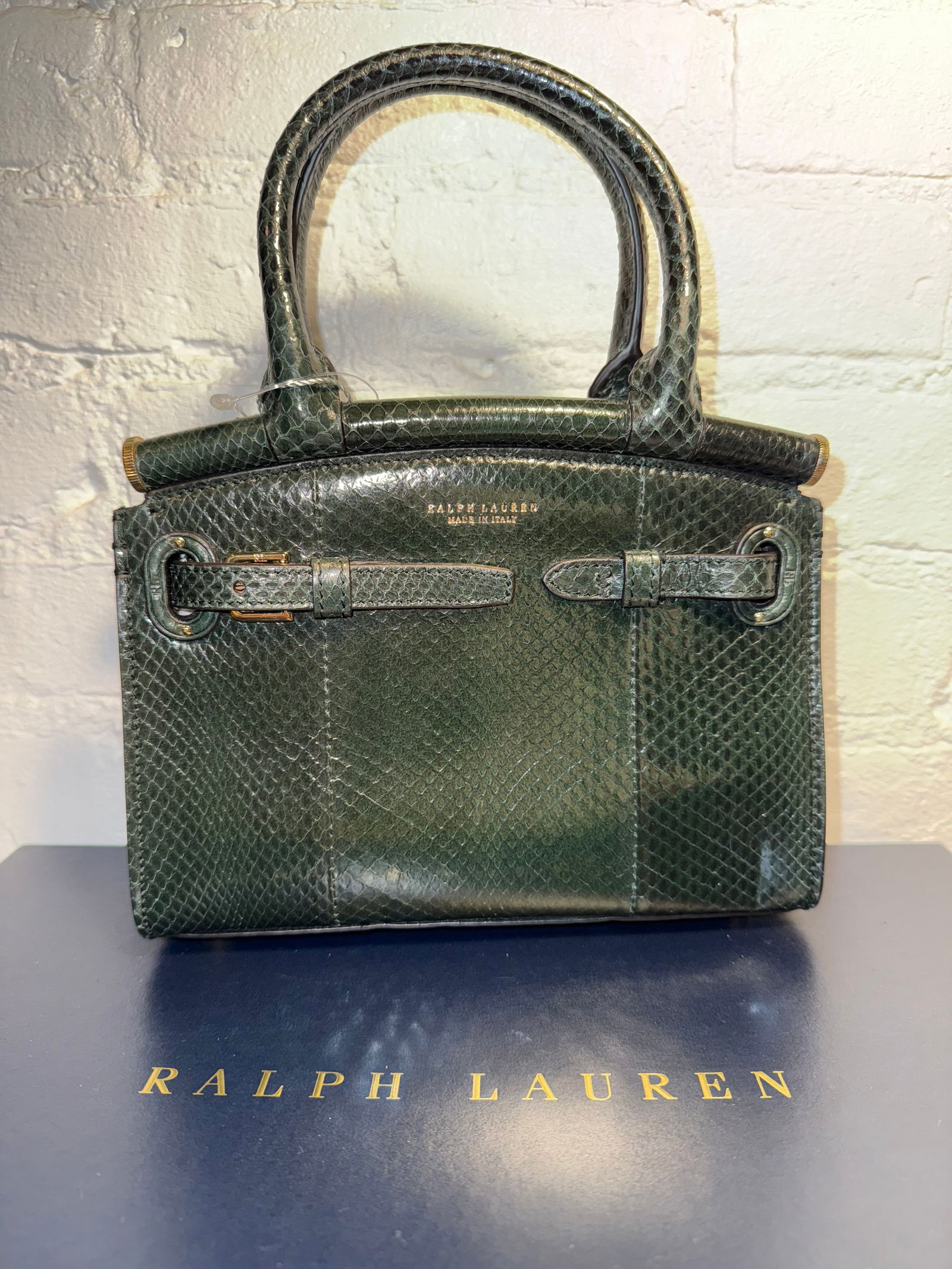 Collection Ralph Lauren Mini RL 50 Handbag: Collection Ralph Lauren Mini RL 50 Handbag Lightly used with torn inside pocket, otherwise great quality. Has removable crossbody strap & keybell Dark Green Lizard Measures approx.SMALL- MINI 8"x6.5"3