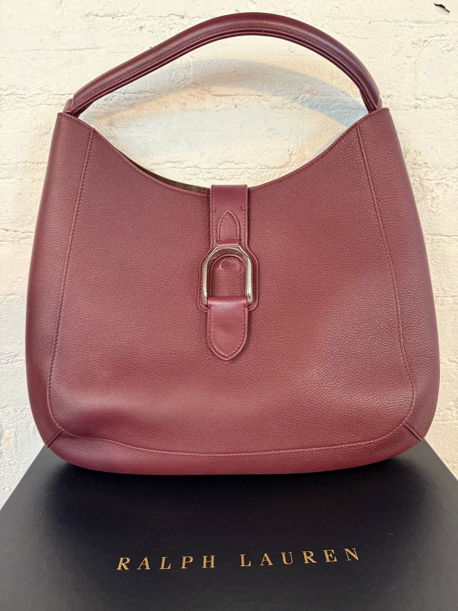 Ralph Lauren Collection Wellington Handbag: Ralph Lauren Collection Wellington Handbag Comes with detachable shoulder strap, new/unused Magnetic closure flap with silver stirrup hardware lined in brown suede with inside phone pocket Burgundy ca