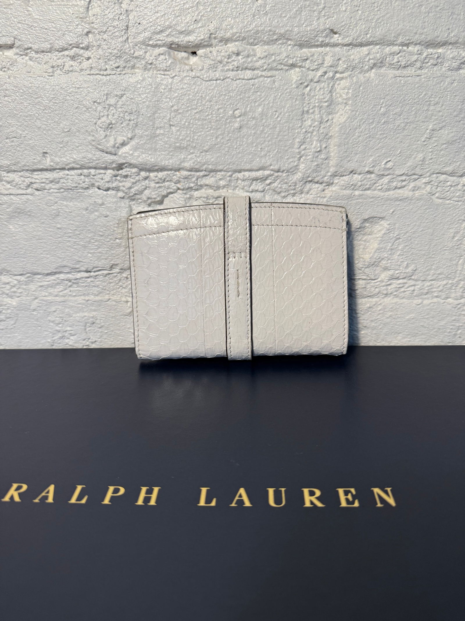 Ralph Lauren Collection Card Case: Ralph Lauren Collection Card Case Lightly used, minor damage inside shown in photos Holds multiple cards, separate cash storage, zipped coin storage. Silver hardware White Lizard Measures approx.close