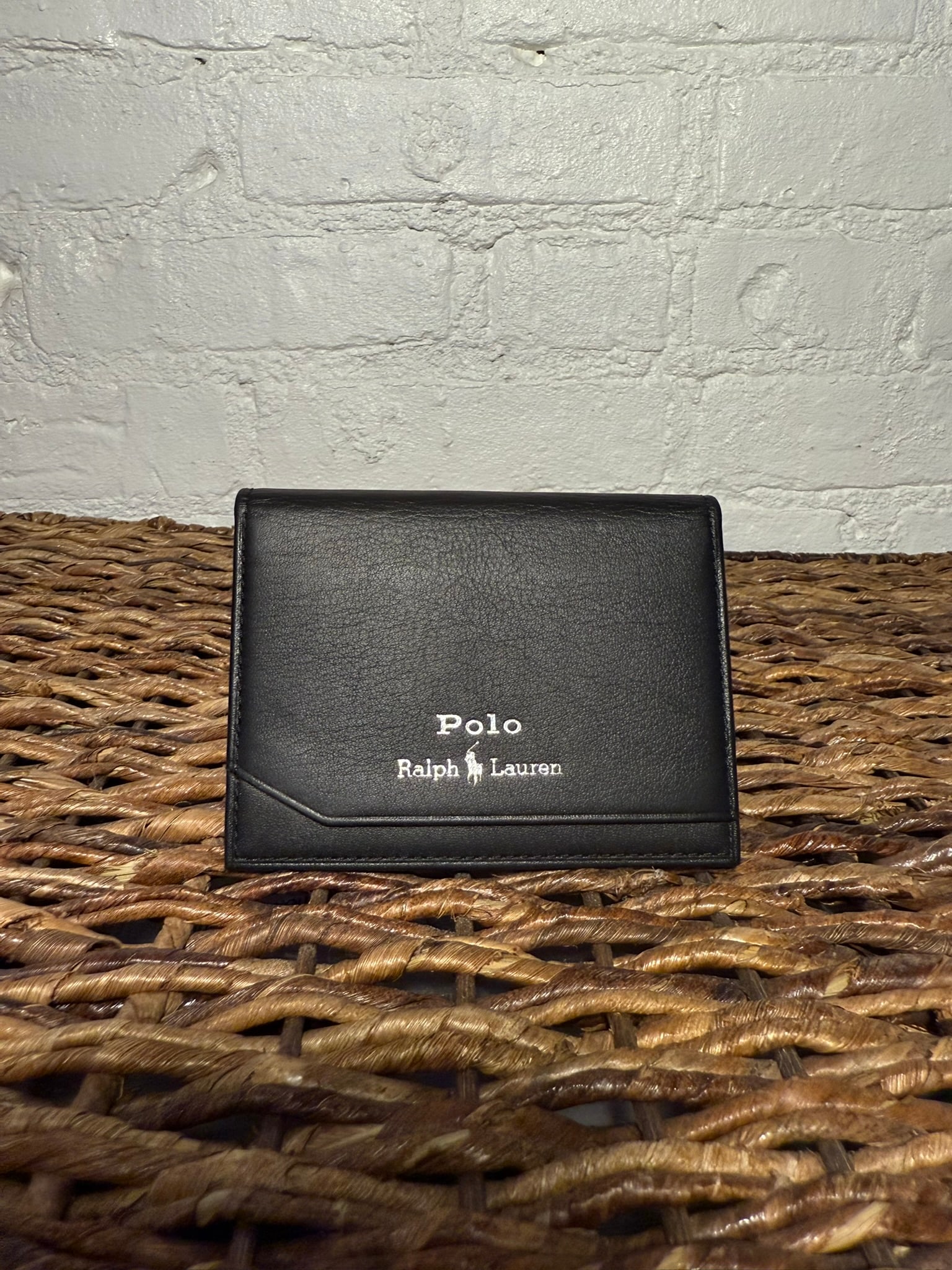 Ralph Lauren Polo Slim Wallet: Ralph Lauren Polo Slim Wallet Black leather. Holds multiple cards. Silver logo Black Measures approx.3"x4.25", opened 6.5"