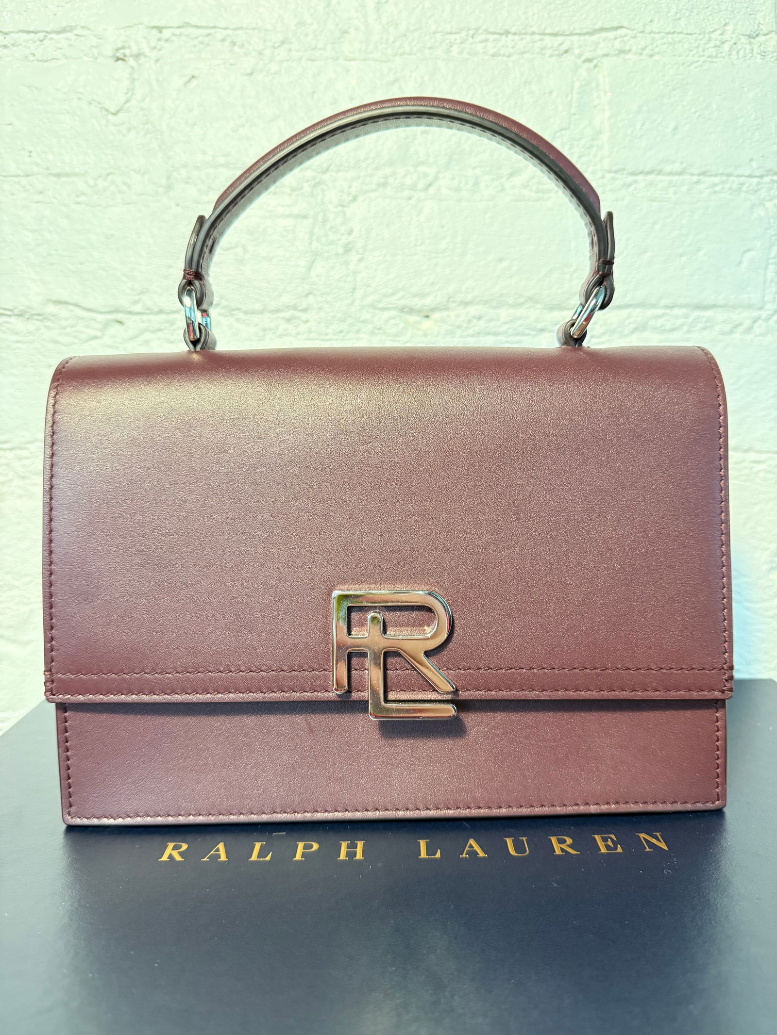 Ralph Lauren Collection Stacked RL Top Handle Bag: Ralph Lauren Collection Stacked RL Top Handle Bag Like new includes detachable crossbody strap. Lined in cognac leather. Snap closure. Silver hardware Burgundy calfskin leather Measures approx.8.5"X6.
