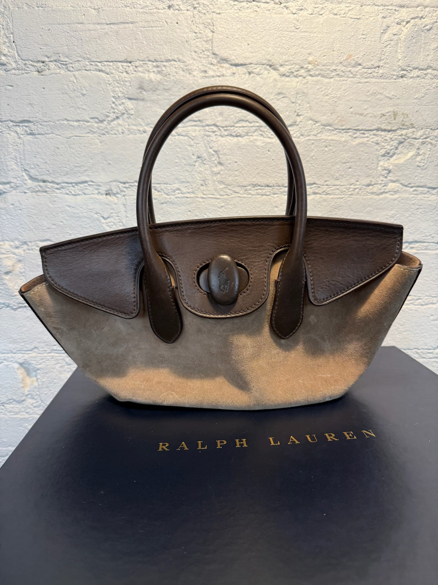 Polo Ralph Lauren Mini Handbag: Polo Ralph Lauren Mini Handbag Lightweight suede bag with leather detailing. Interior pocket. Lightly used with some signs of wear shown in photos. Dark Brown Leather with Tan Calfsuede Measures appro