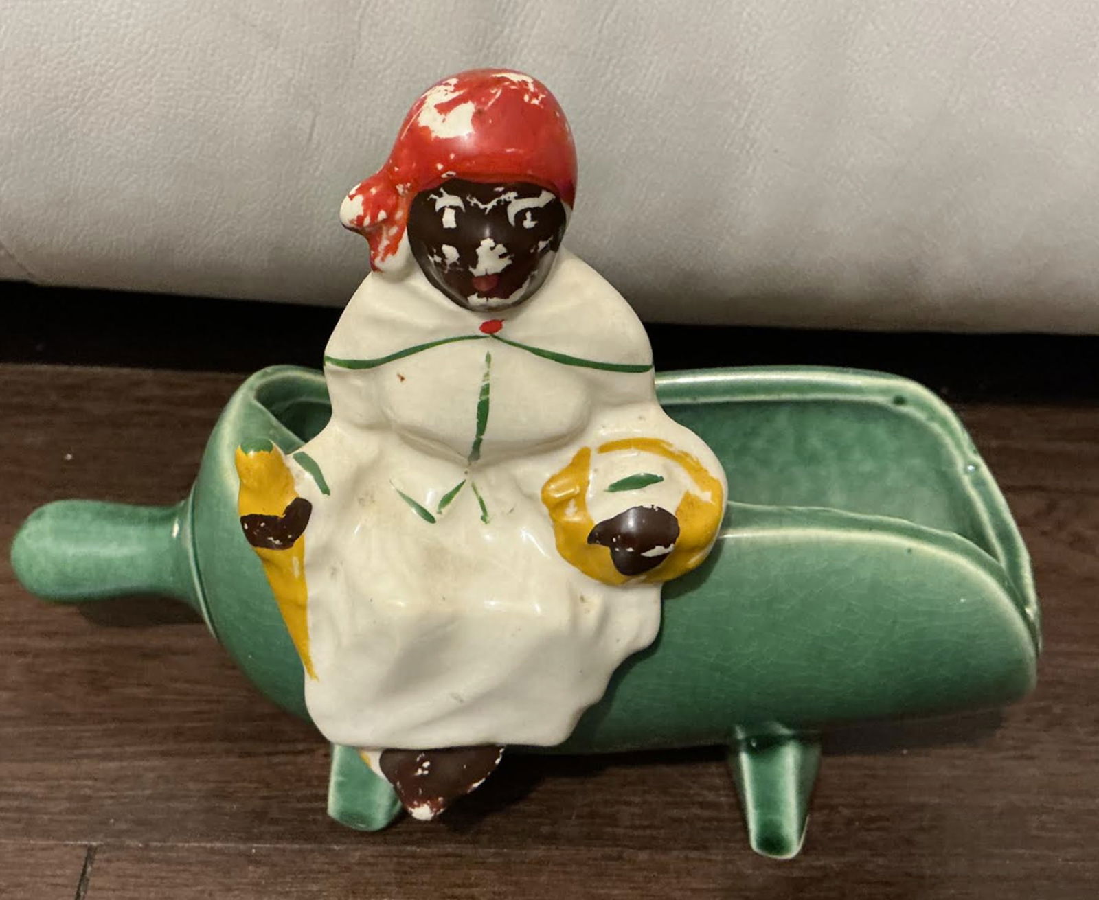 Black Americana Era McCoy Pottery Hand Sugar Scoop Planter, Spoon Rest: Black Americana Era McCoy Pottery Hand Sugar Scoop Planter, Spoon Rest. The handle tip is crazed but looks see images. Marked McCoy. Approximately 7.0L x 5.25H x 3.25W in.