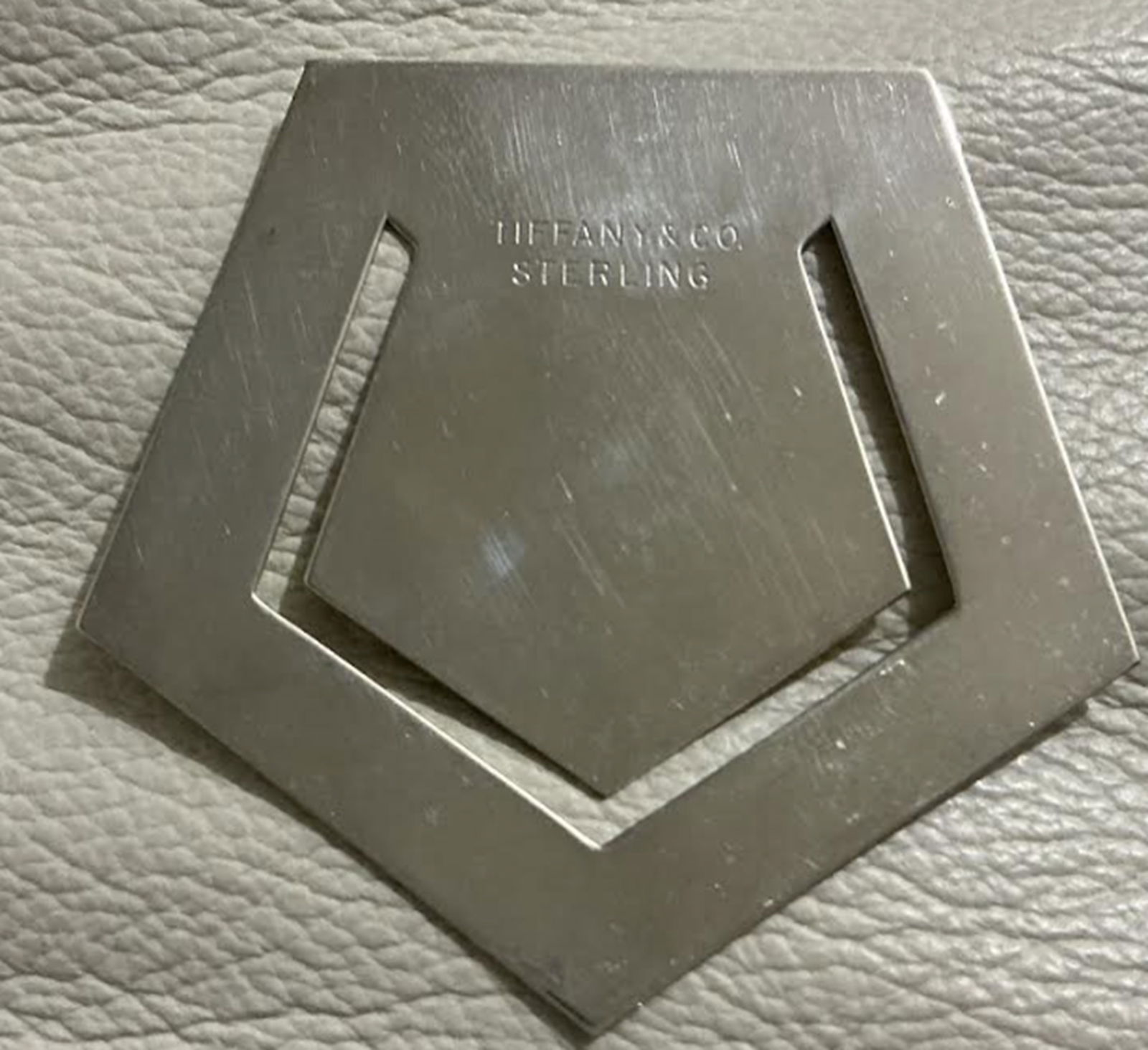 Tiffany & Co. Sterling Silver Paperweigt Bookmark: Tiffany & Co. Sterling Silver Paperweigt Bookmark. Measures approx 2 inches pentagon shape