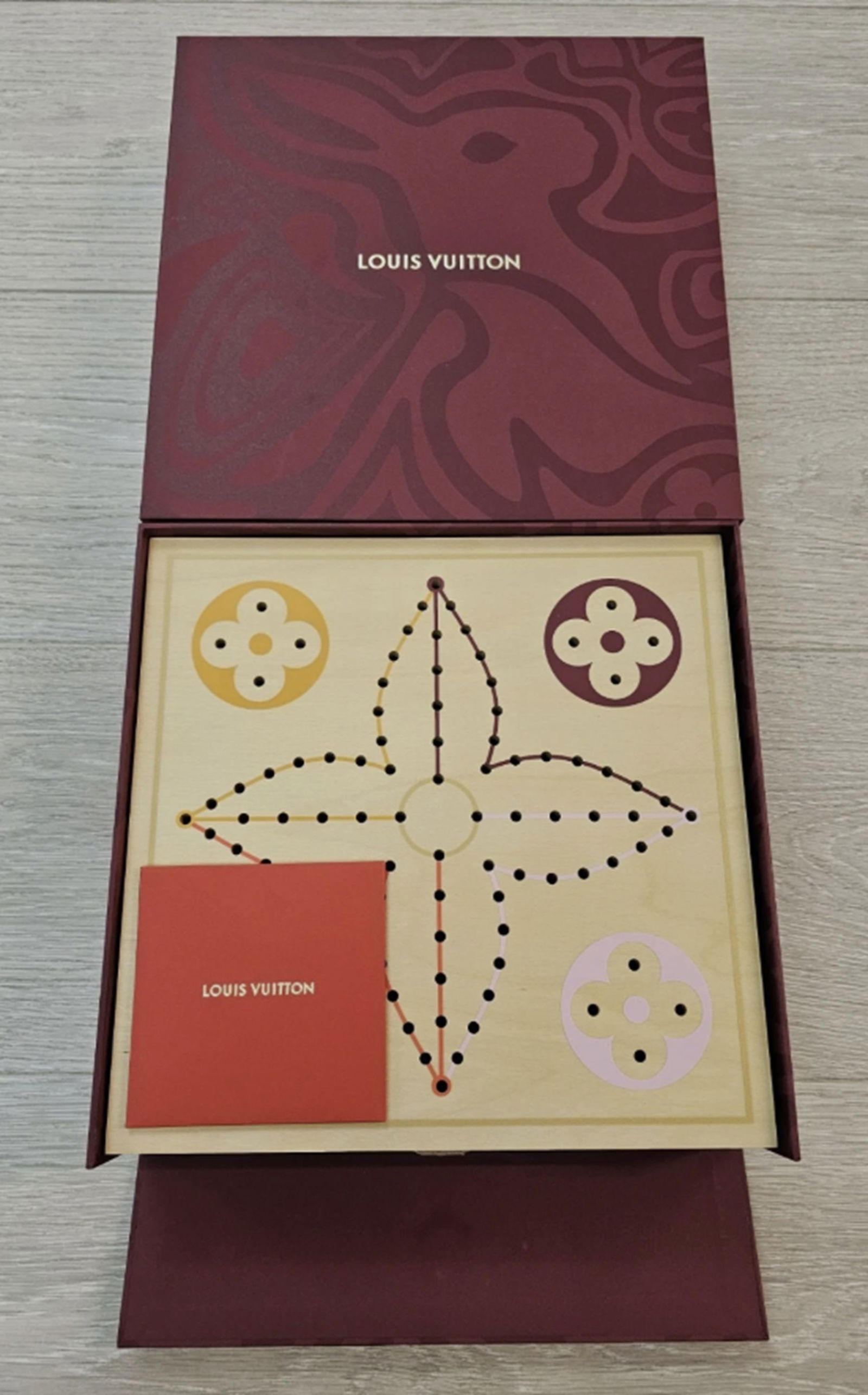 LOUIS VUITTON Vivienne Pegboard Game: LOUIS VUITTON Vivienne Pegboard Game