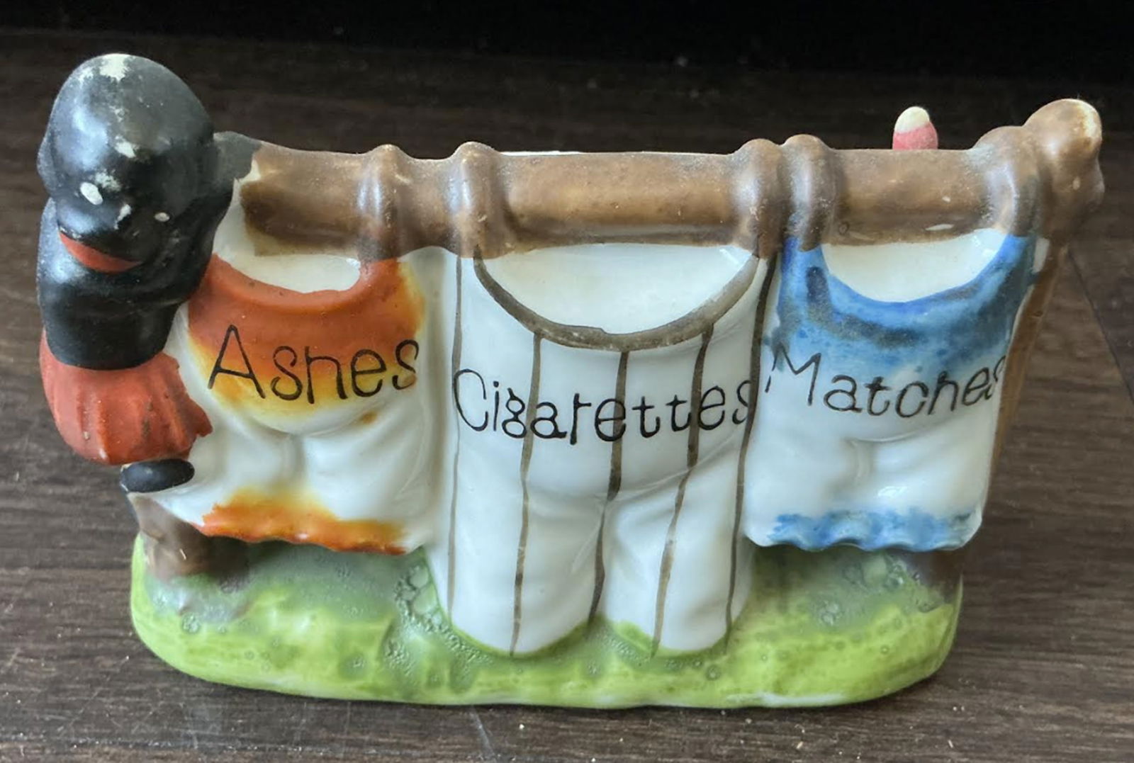 Black Americana Era Porcelain Holder Made in Japan: Black Americana Era Porcelain Holder Made in Japan Measures approx 3.5 inches wide x 2.5 inches high made in Japan