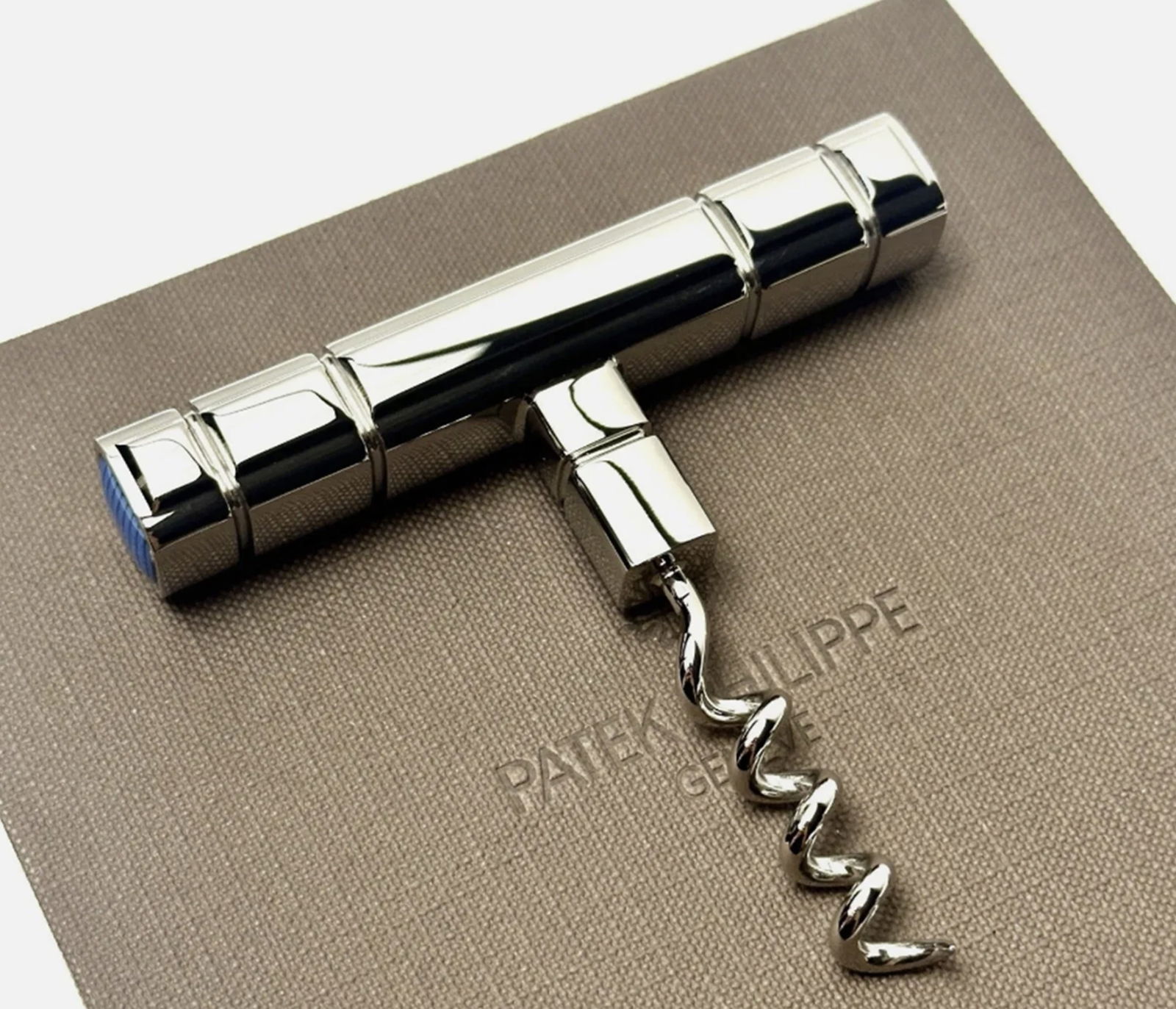 Patek Philippe Wine Corkscrew Bottel Opener With Box: Patek Philippe Wine Corkscrew Bottel Opener With Box Measures approx 3.5 inches wide come with box