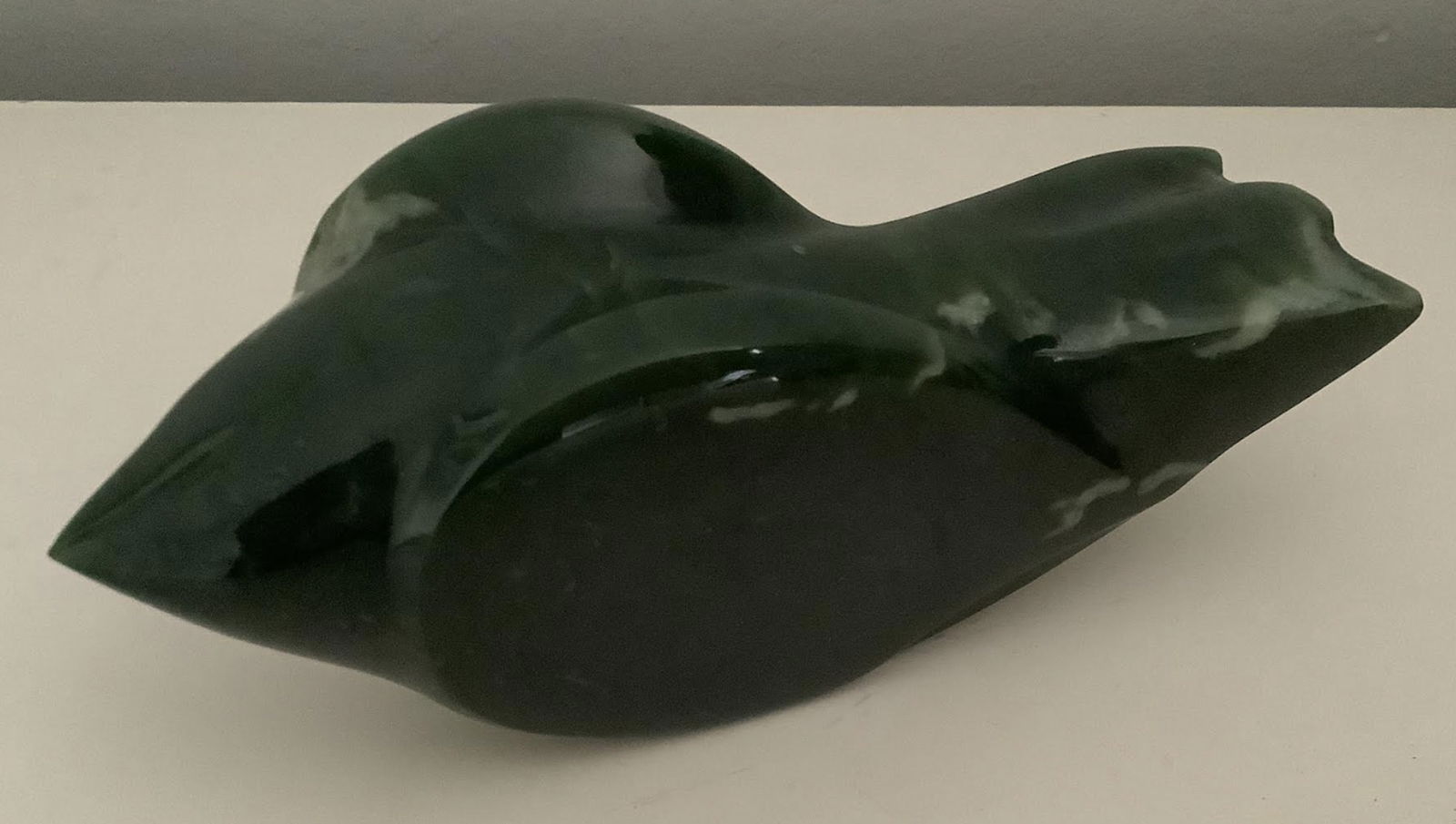 Green Nephrite Jade Figurine Statuette: Green Nephrite Jade Figurine Statuette. Measures approx 6 3/4 inches long2.25 inches wide. No chips or cracks present