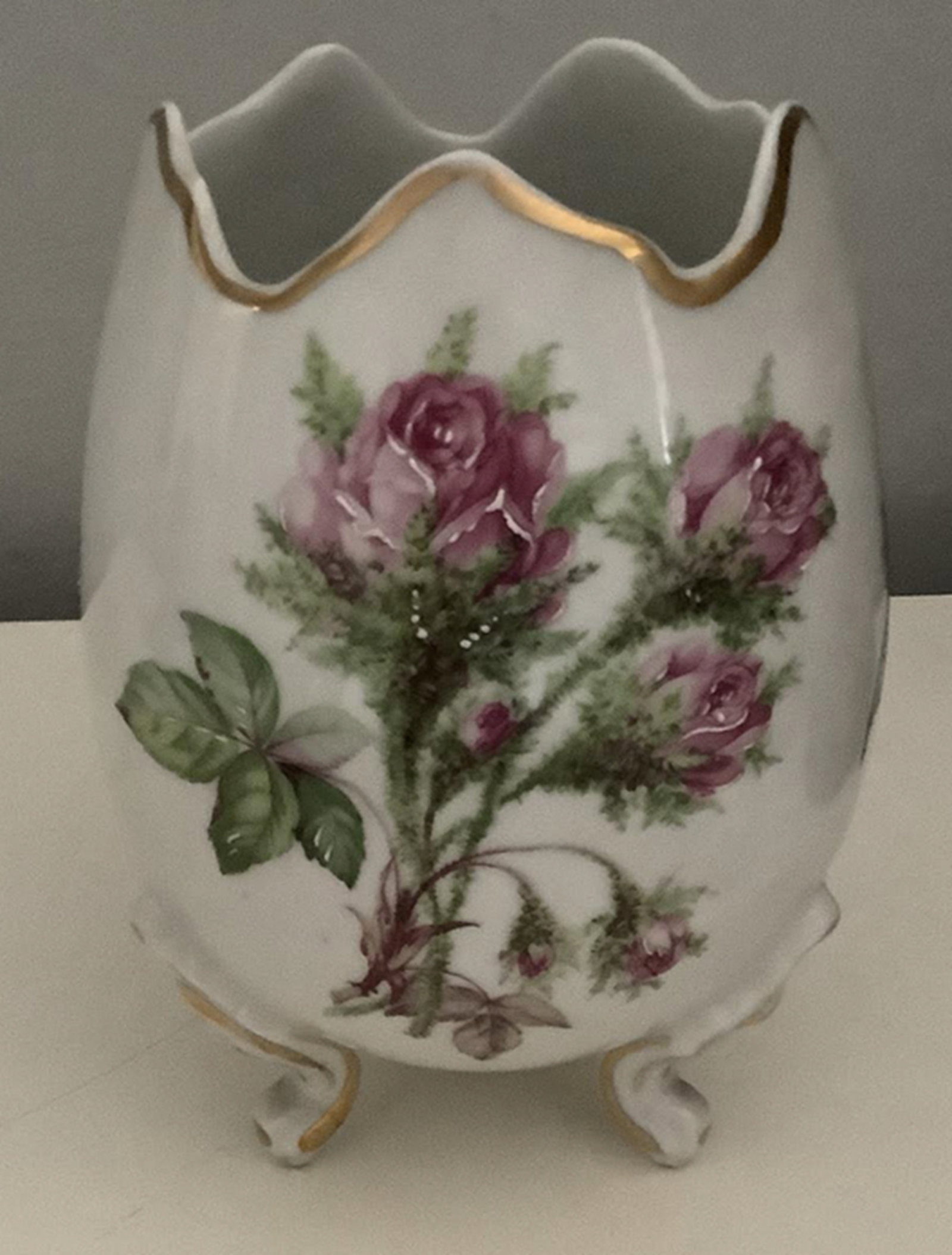 Limoge Signed 3 legged Porcelain floral Vase With Gold Accents: Limoge Signed 3 legged Porcelain floral Vase With Gold Accents. Measures approx 6.5inches at tallest point3.5 inches at opening top 5 inches across body widthLimoge makers mark no chips or cracks pres