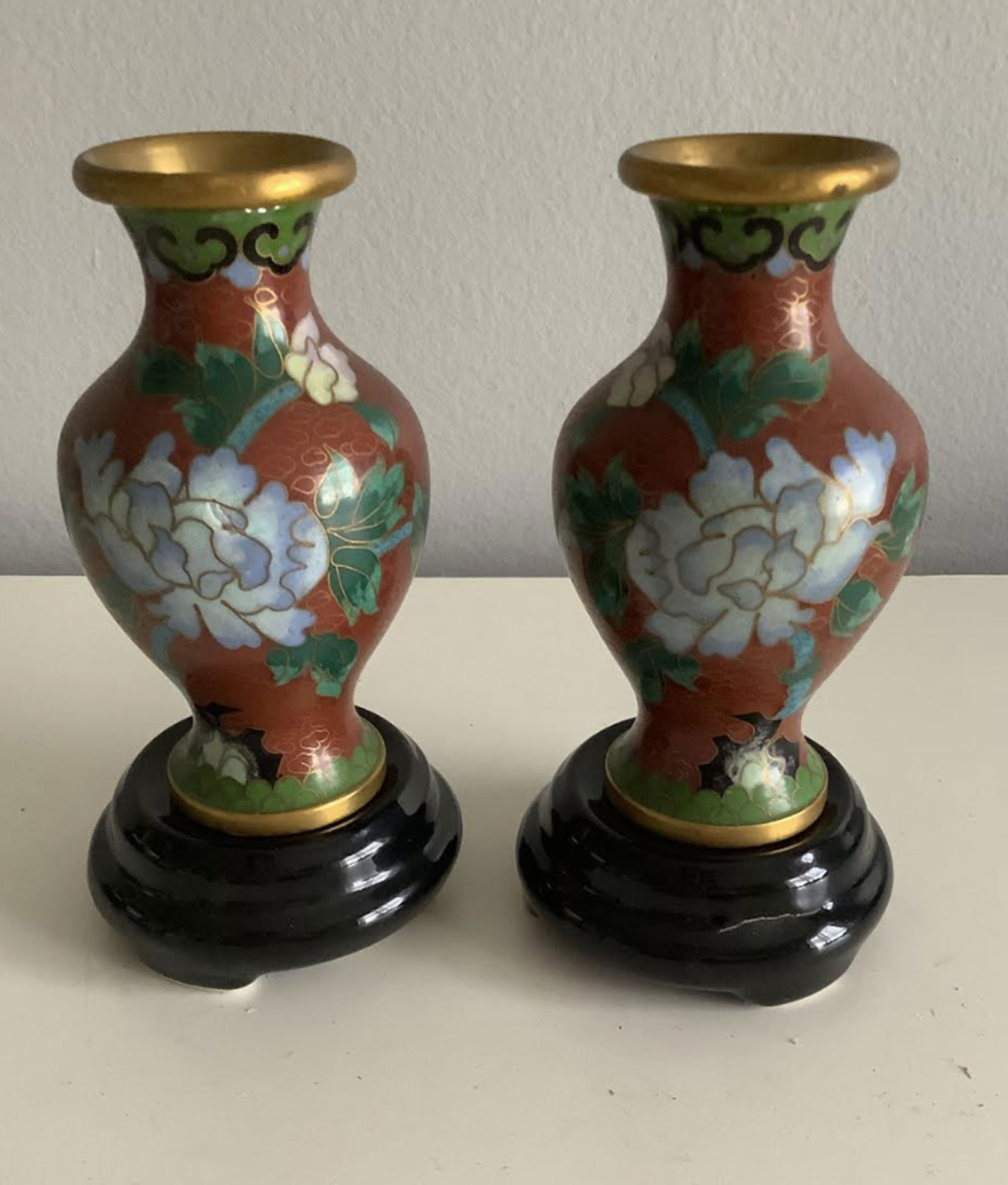 Pair Of Chinese Cloisonne Tall Vase With Wooden Stands: Pair Of Chinese Cloisonne Tall Vase With Porcelain Stands. Measures approx 4.25 inches tallStand s are approx 3 inches wide