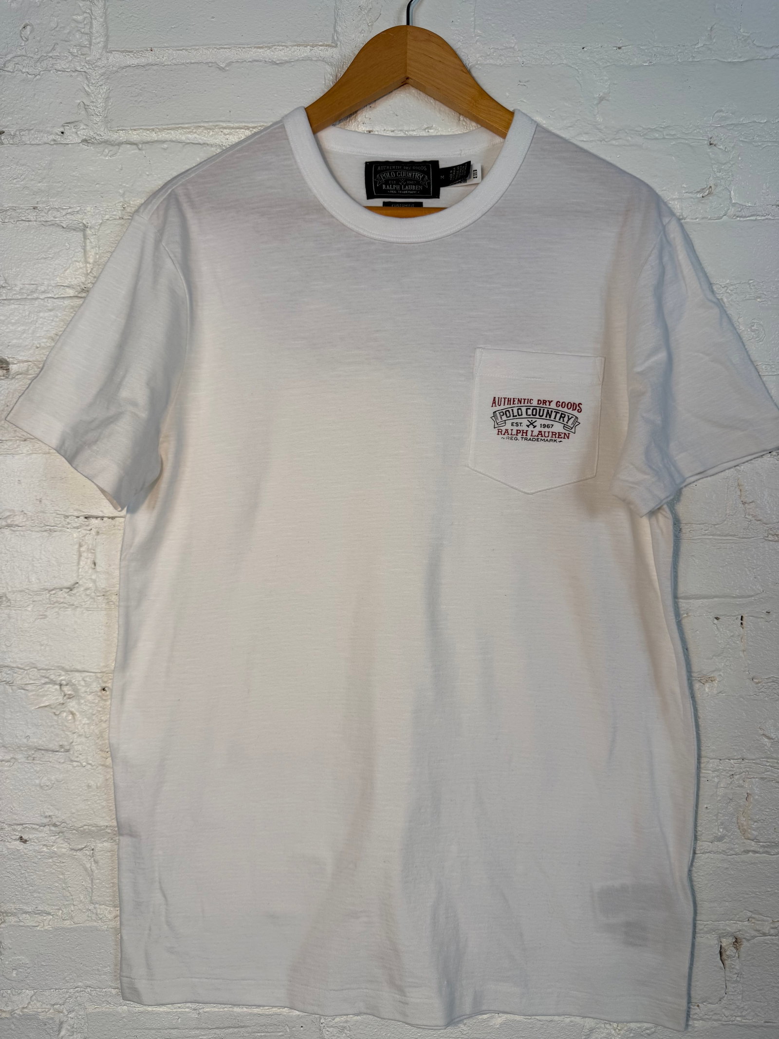 Polo Ralph Lauren Men's T-Shirt: Men's cotton t-shirt. Lightly worn, in great condition. Size medium custom fit White Measures approx center front collar to hem 25 inches armpit to armpit 20.5 inches
