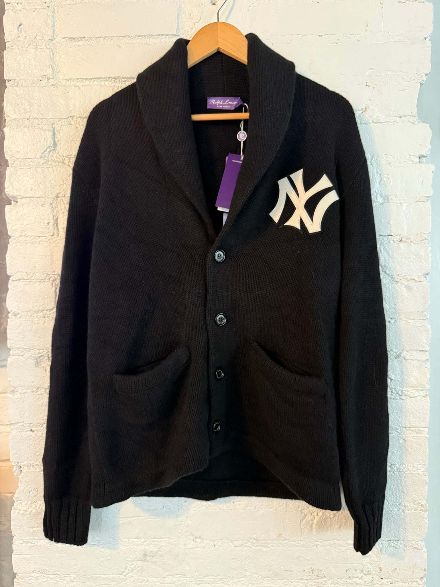 Ralph Lauren Purple Label Yankee Cardigan: New with tags Men's Purple Label Yankee cashmere shawl collar cardigan sweater with leather Yankee embellishments. Size small Measures approx 25.5" sleeve length 26.5" back length 21.5" across back