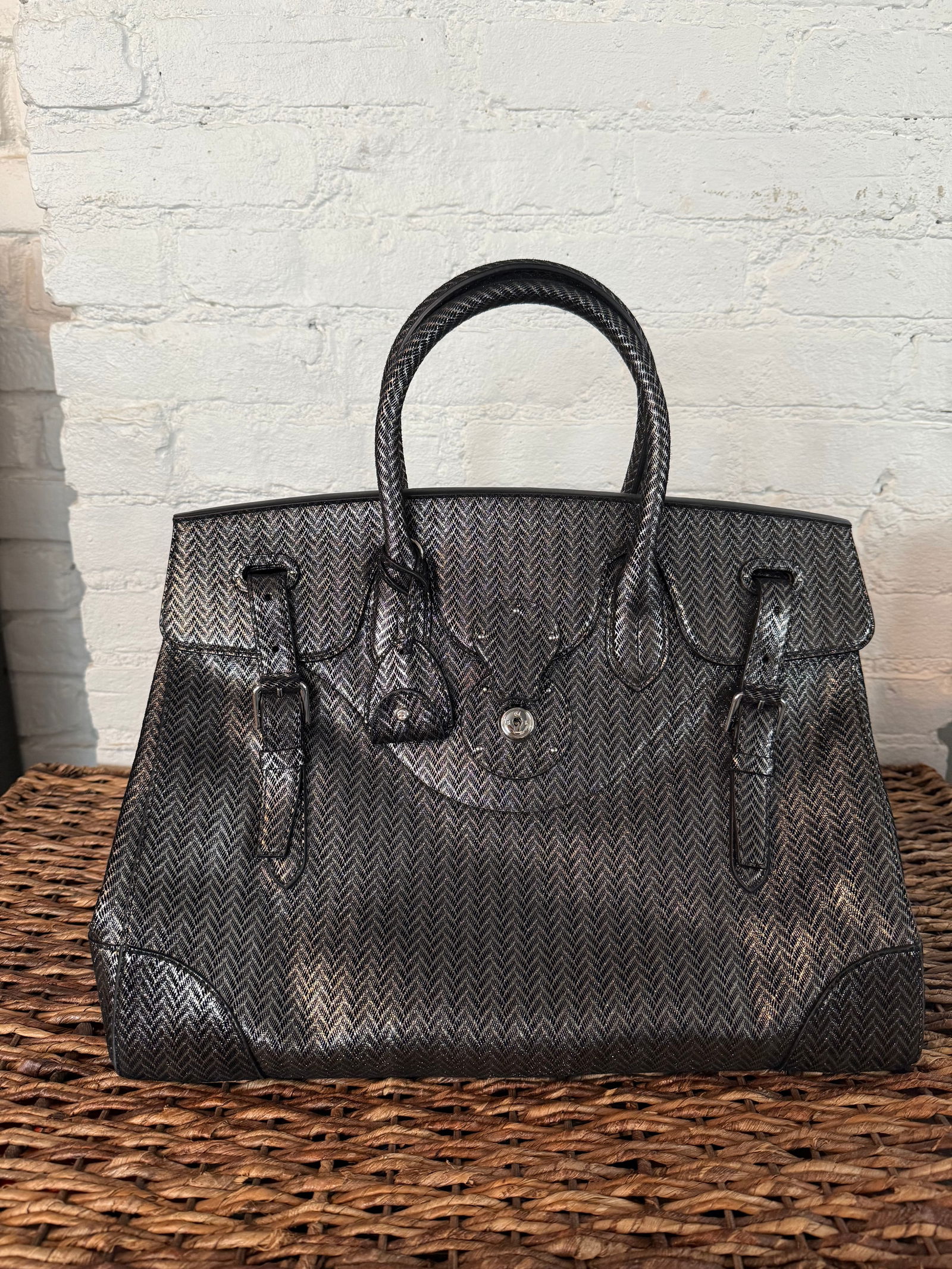 Collection Ralph Lauren Lightweight Ricky 40 Handbag: Metallic Silver & Black herringbone fabric exterior with black leather backing/interior. Interior zip pocket. Keybell and wide crossbody strap included. Lightly used, like new. Metallic Silver & Black
