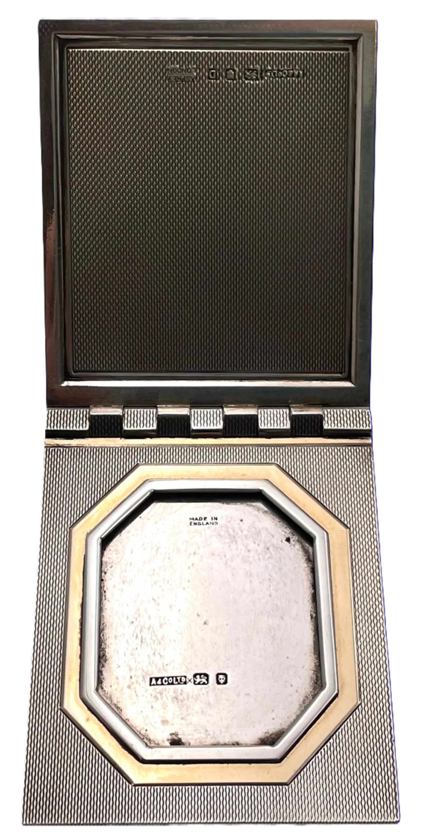Asprey Gold and Sterling Silver 1939 Picture Photo Frame: Asprey Gold and Sterling Silver 1939 Picture Photo Frame. Asprey sterling silver picture frame, with gold inlaid, from 1939, made in London, England, beautifully engine turned. It measures 2 5/8'' by 