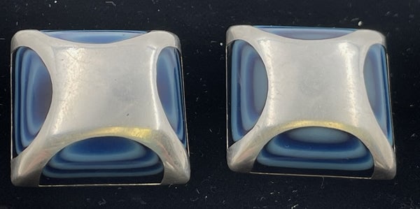 Pair of Mexican Sterling Silver & Blue Enamel Earrings in Art Deco Style: Pair of Mexican sterling silver inlaid with blue enamel earrings in Art Deco style, which measure 1 1/8'' by 1 1/8''. They bear hallmarks as shown.