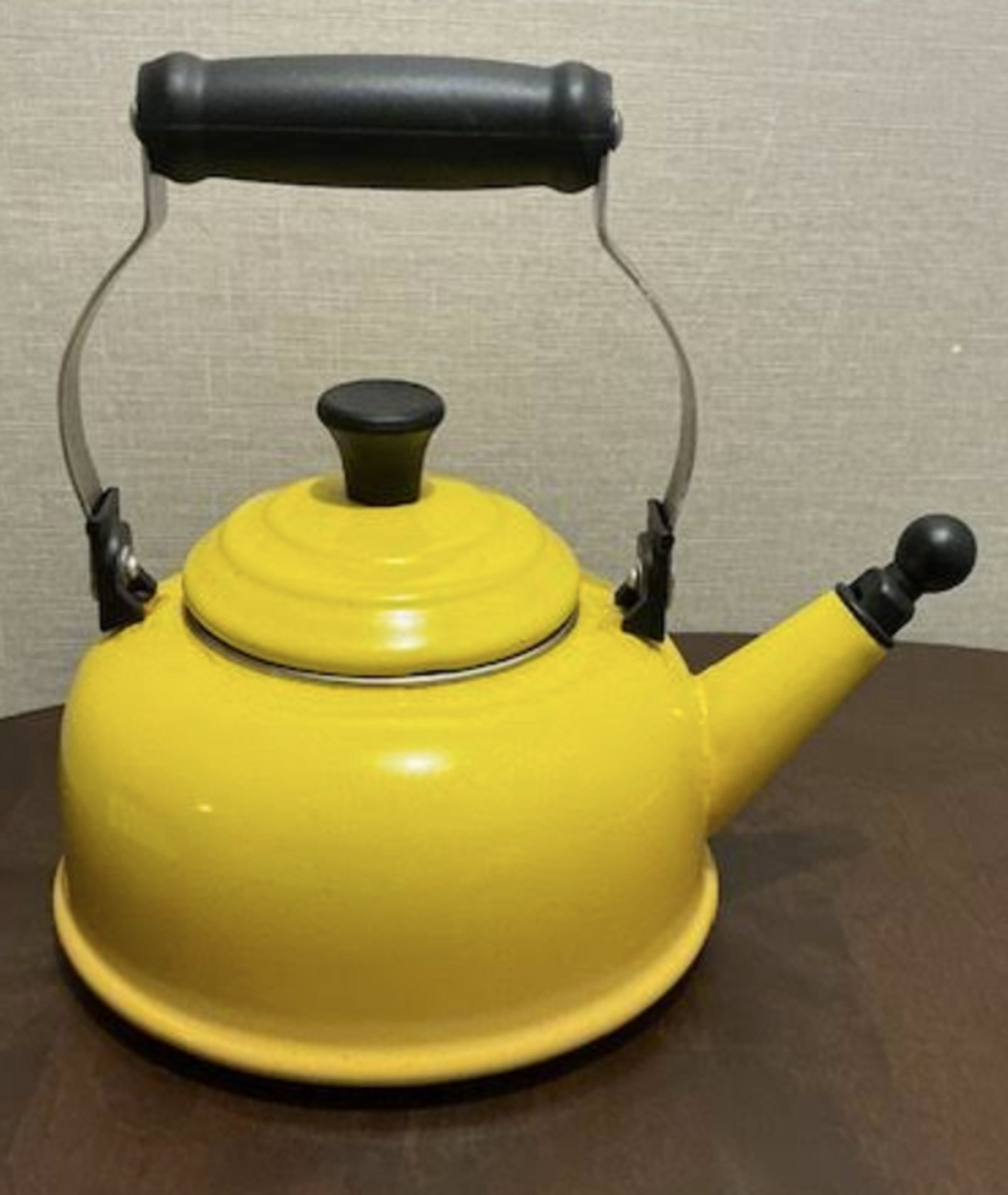 Le Creuset enamel-on-steel whistling kettle: Le Creuset Enamel-on-Steel Whistling Kettle Measures approx 8.5 inches wide and 10.5 inches tall