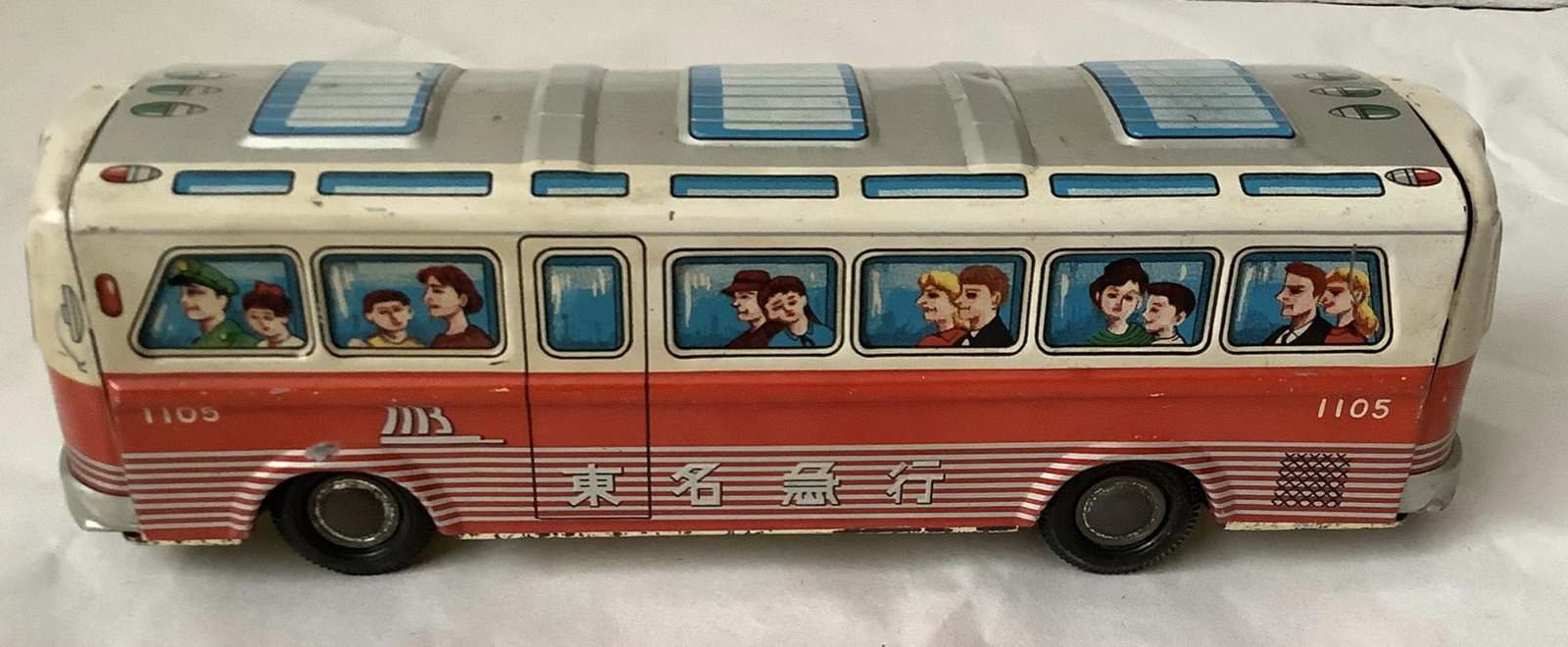 Japanese Tin Litho Bus 1105: Japanese Tin Litho Bus 1105 Measures approx 8.5 inches long 2.5 inches high