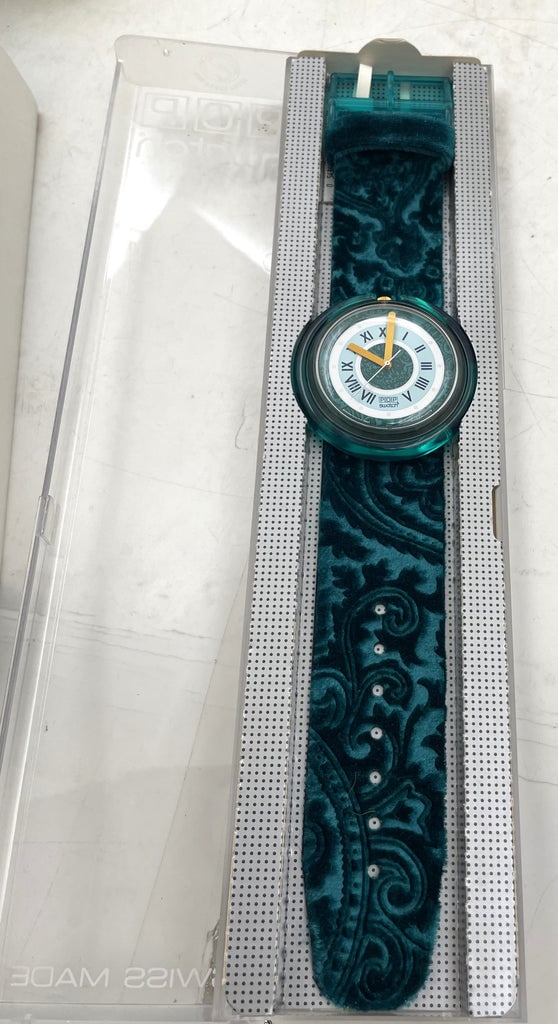 Swatch Watch New in Box: Swatch watch, with made in France leather band. Sold new in box with original tags.