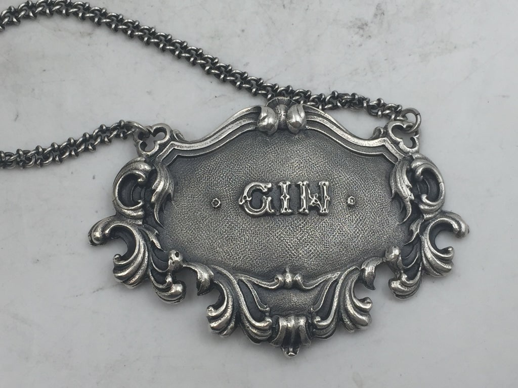Buccellati Italian Sterling Silver Gin Claret Bar Jug Label: Rare Buccellati sterling silver claret bar jug label. GIN embossed on the front in the center.Marks on the back: Gianmaria Buccellati (signature and Italian maker's mark), ITALY, 925 (encircled silver