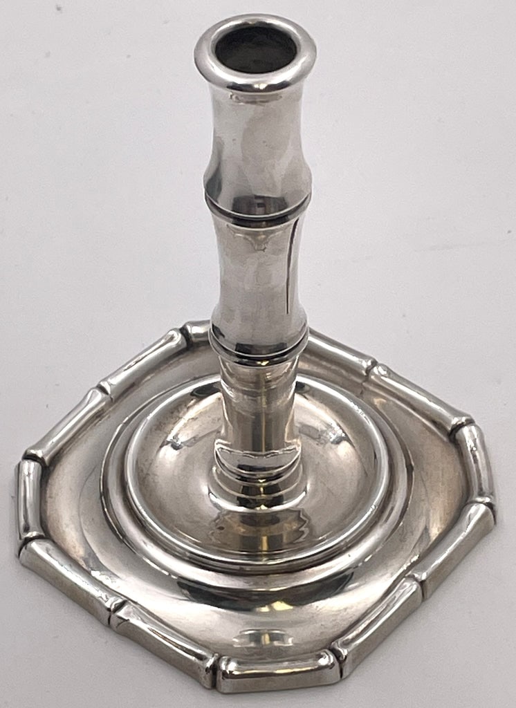Tiffany & Co. Sterling Silver Taperstick/ Candlestick in Bamboo Pattern: Rare Tiffany & Co. sterling silver taperstick or candlestick in the celebrated Bamboo pattern number 23935, with an elegant, geometric design. It measures approx. 4 1/4'' in height and stands on a qua