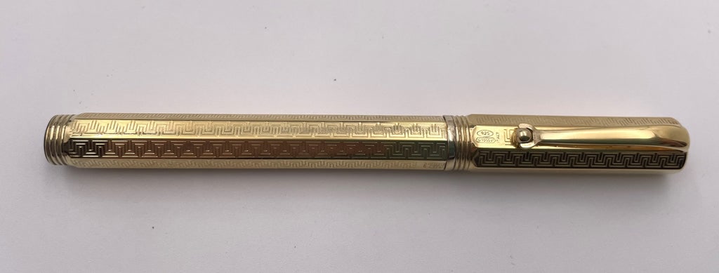 Montegrappa Gilt Sterling Silver Reminiscence Fountain Pen: Rare Montegrappa gilt sterling silver Reminiscence fountain pen, beautifully adorned with Greek frieze-style motifs, with an 18k gold nib, in excellent condition. It is sold in its original box with i