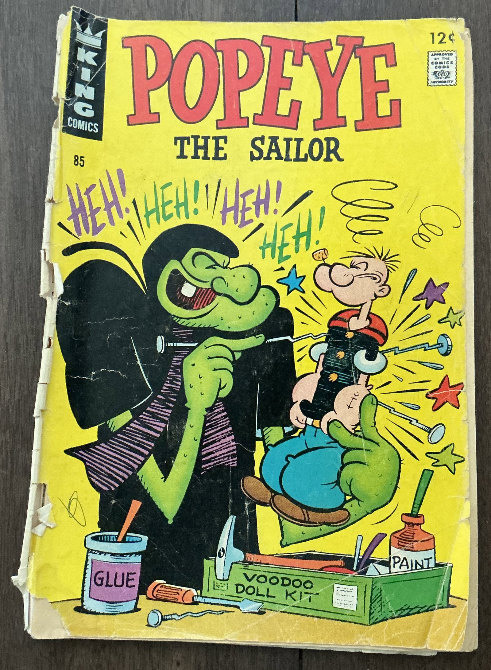 Popeye the Sailor No. 85: Popeye the Sailor No. 85 is a lively Silver Age King Comics issue featuring the legendary spinach-loving sailor in a classic humorous adventure cover scene. The bright yellow cover, exaggerated cartoo