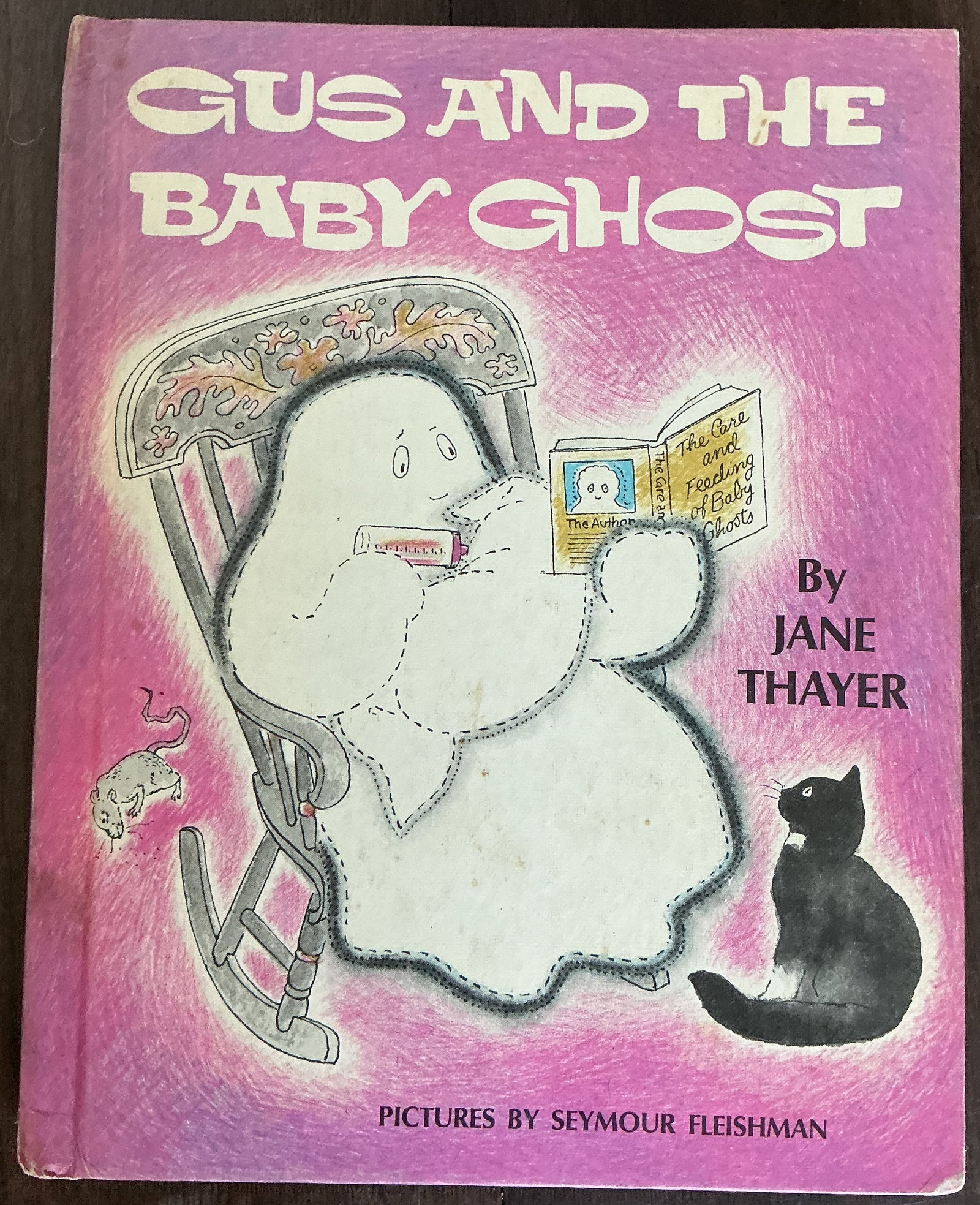 Gus and the Baby Ghost Hard Cover Book By Jane Thayer and Seymour Fleishman 1972: Gus and the Baby Ghost Hard Cover Book By Jane Thayer and Seymour Fleishman 1972 is a vintage illustrated children’s storybook by Jane Thayer, featuring whimsical ghost-themed storytelling with char