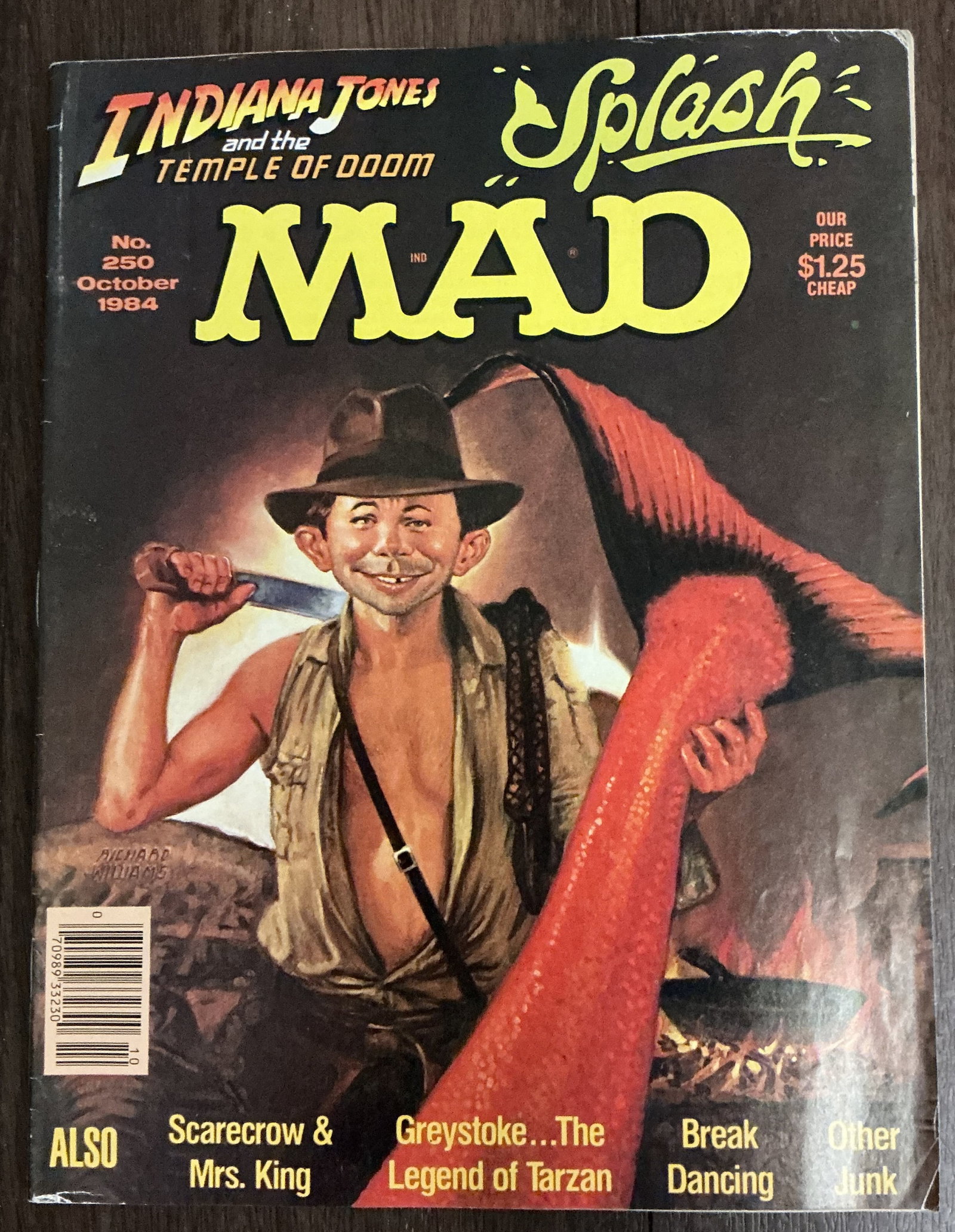 MAD Magazine Indiana Jones and the Temple of Doom No. 250 October 1984: MAD Magazine Indiana Jones and the Temple of Doom No. 250 October 1984 featuring a parody cover inspired by Indiana Jones and the Temple of Doom with Alfred E. Neuman in classic MAD satirical fashion.