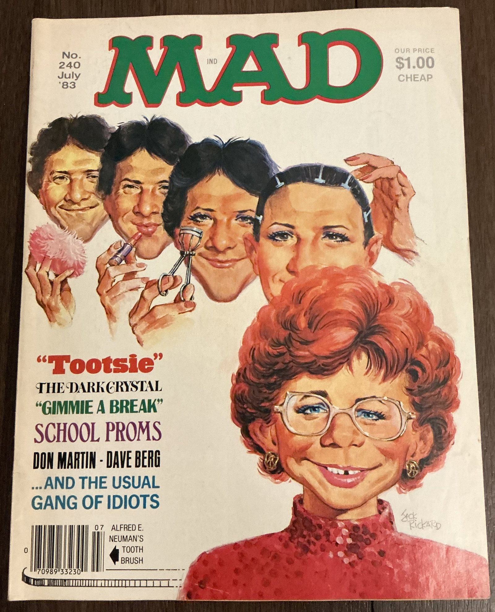 MAD Magazine No. 240 July 1983: MAD Magazine No. 240 July 1983 featuring a cover parody inspired by the Academy Award-nominated film Tootsie starring Dustin Hoffman. The cover art by Jack Rickard transforms Alfred E. Neuman into