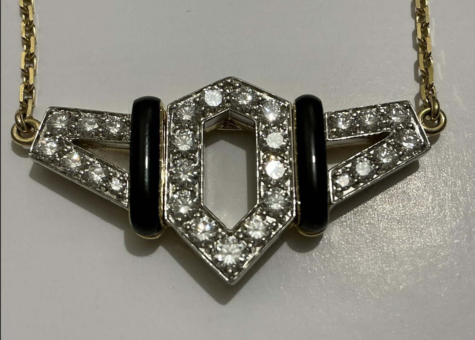 DAVID WEBB Signed Diamonds With 18K Gold Wtih Platinum and Black Enamel Flight Pendant Necklace: DAVID WEBB Signed Diamonds With 18K Gold and Black Enamel Flight Pendant Necklace . David Webb Marked: 18K WEBB 900 PLAT Diamond Diamonds weight approx 1.80 ct Width : 3.5 cm • Length : 40