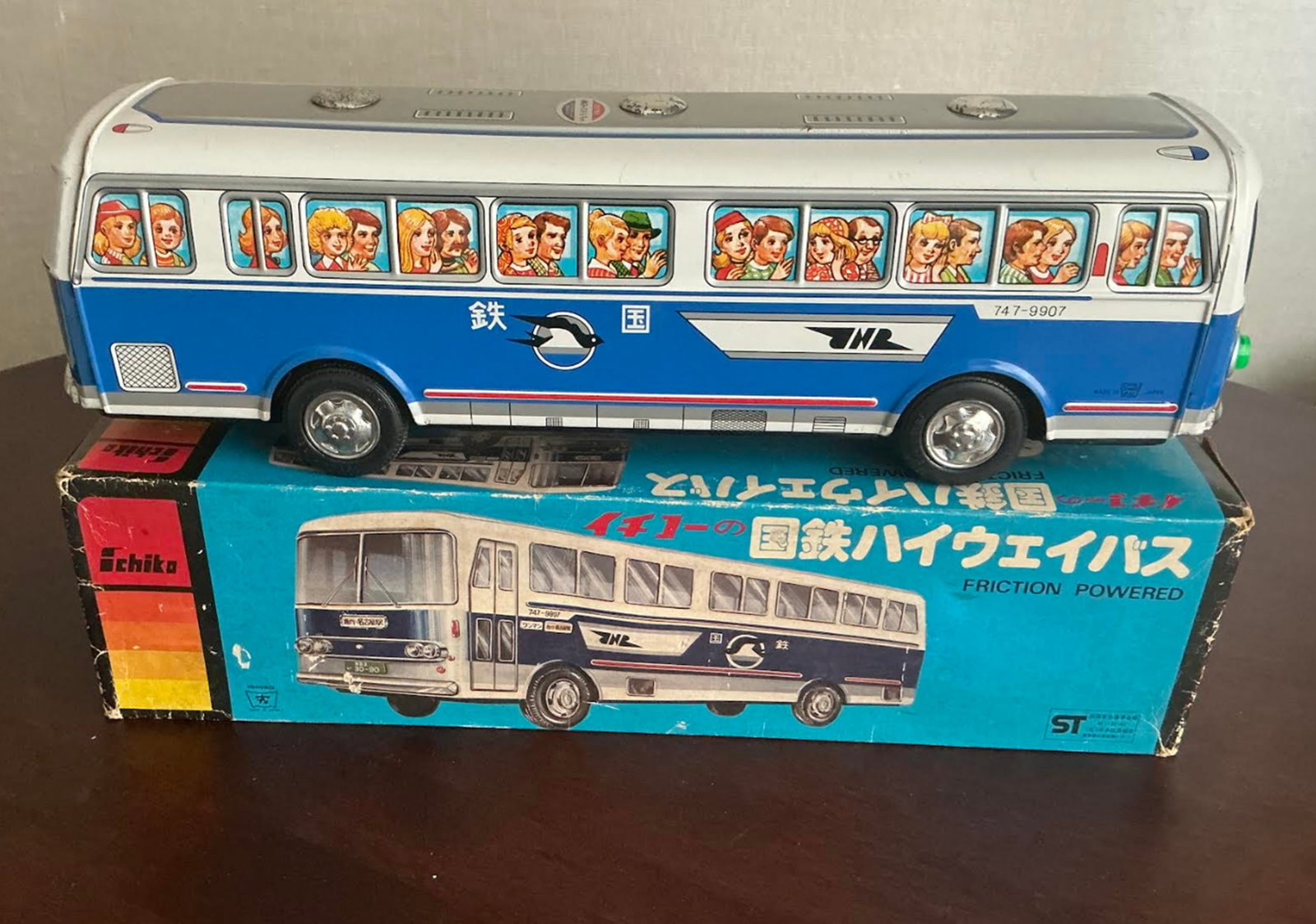 ICHIKO Tin Lithograph Friction Bus with Box 15.5 Inches Long Made in Japan: ICHIKO Tin Lithograph Friction Bus with Box 15.5 Inches Long Made in Japan. exceptional model of a EXTREMELY LARGE sized Bus! It is one from a wonderful series, produced by the Japanese Ichiko Company