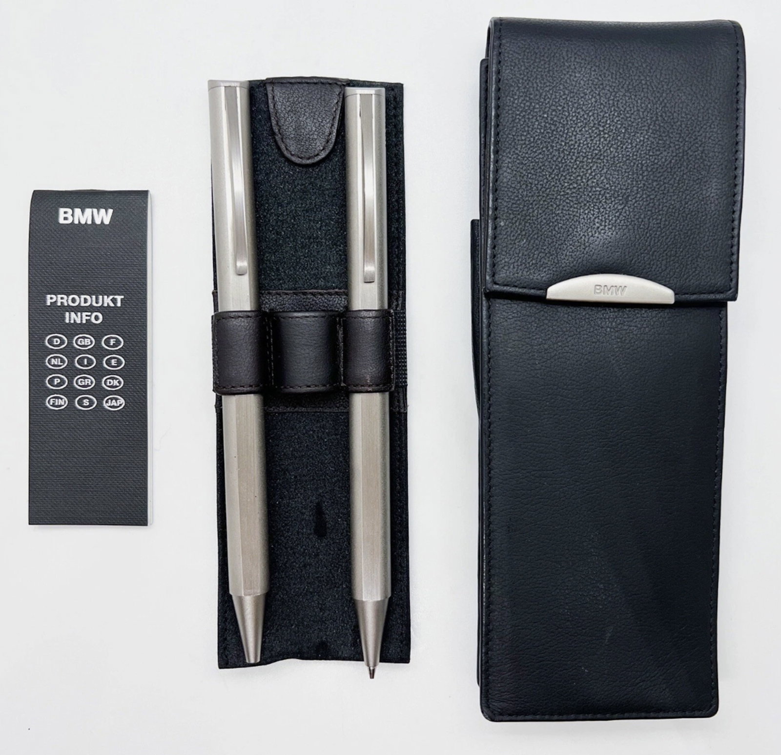 BMW Titanium Ballpoint & Mechanical Pencil Set Diplomat With Leather Case: BMW Titanium Ballpoint & Mechanical Pencil Set Diplomat With Leather Case. BMW titanium version ballpoint pen and mechanical pencil with leather case.Pencil: very good condition with twist