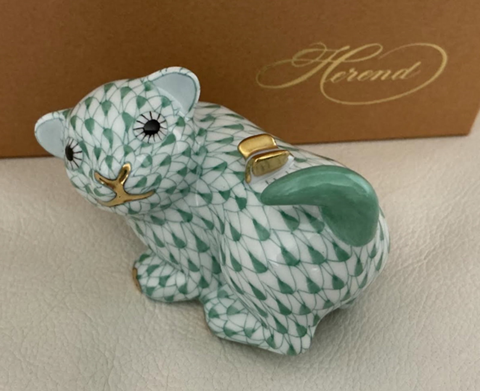 Herend Signed Porcelain Green Fishnet Dog Figurine with 24k Gold Accents Made in Hungary.: Herend Signed Porcelain Green Fishnet Dog with 24k Gold Accents Made in Hungary. Measures approx 2.5 inches wide and 2 inches Tall No chips or cracks present