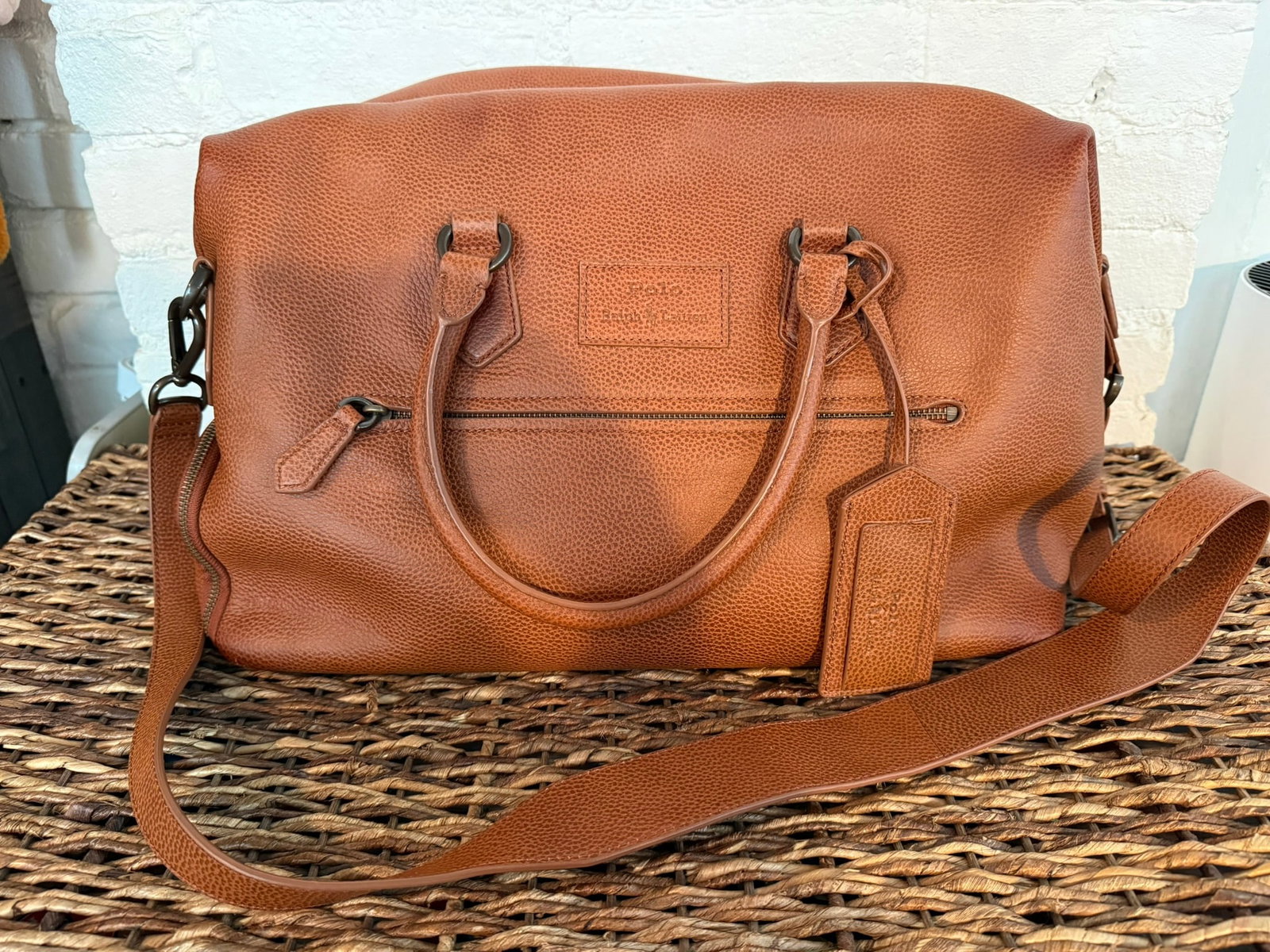 Polo Leather Duffle: New polo duffle with multiple internal and external compartments and crossbody strap Cognac Leather