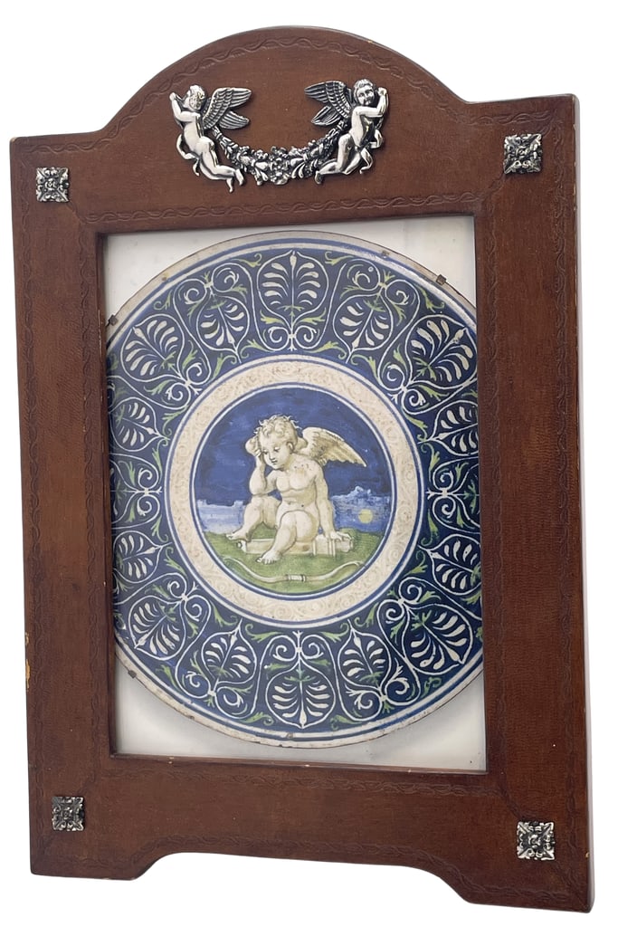 William Scott English Leather and Sterling Silver Picture Frame with Putti: William Scott leather picture frame with applied sterling silver floral motifs. It measures approx. 11'' by 7 1/2'' (inner dimensions are 7'' by 5'') and bears hallmarks as shown. It is in new conditi