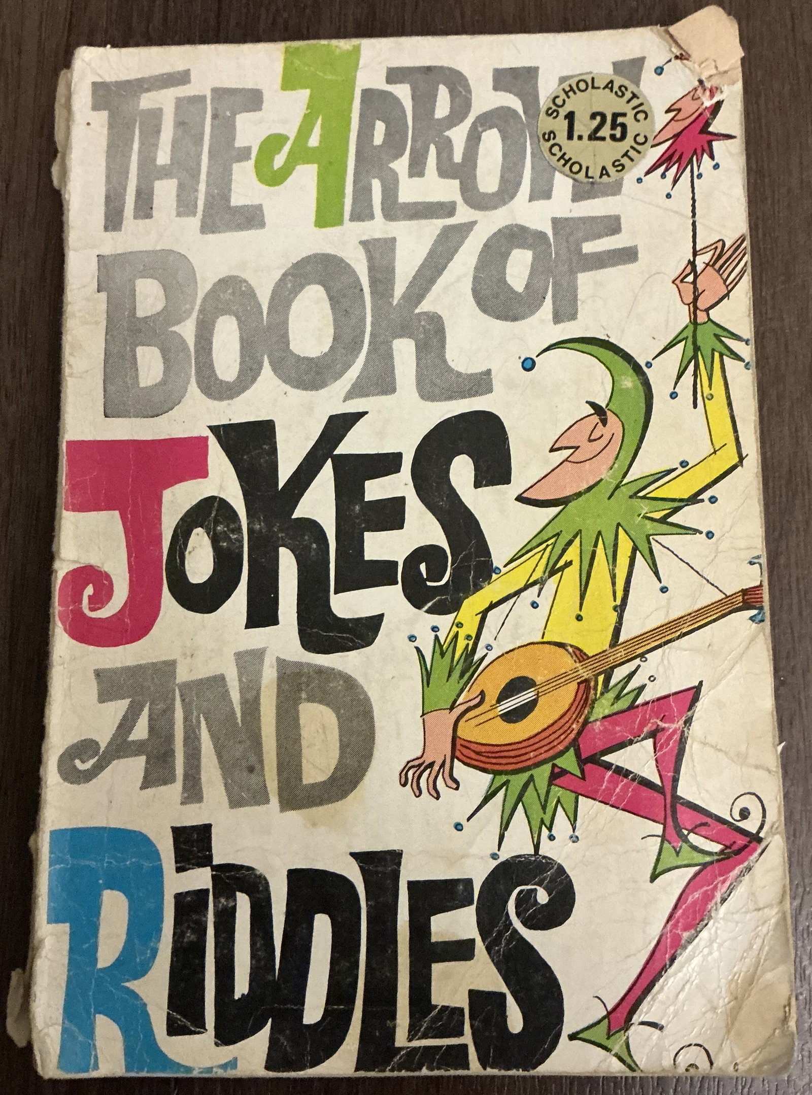 The Arrow Book of Jokes and Riddles 1954: The Arrow Book of Jokes and Riddles 1954 is a vintage Scholastic paperback filled with children’s humor, riddles, puns, and playful illustrations. Published during the classic era of Scholastic scho