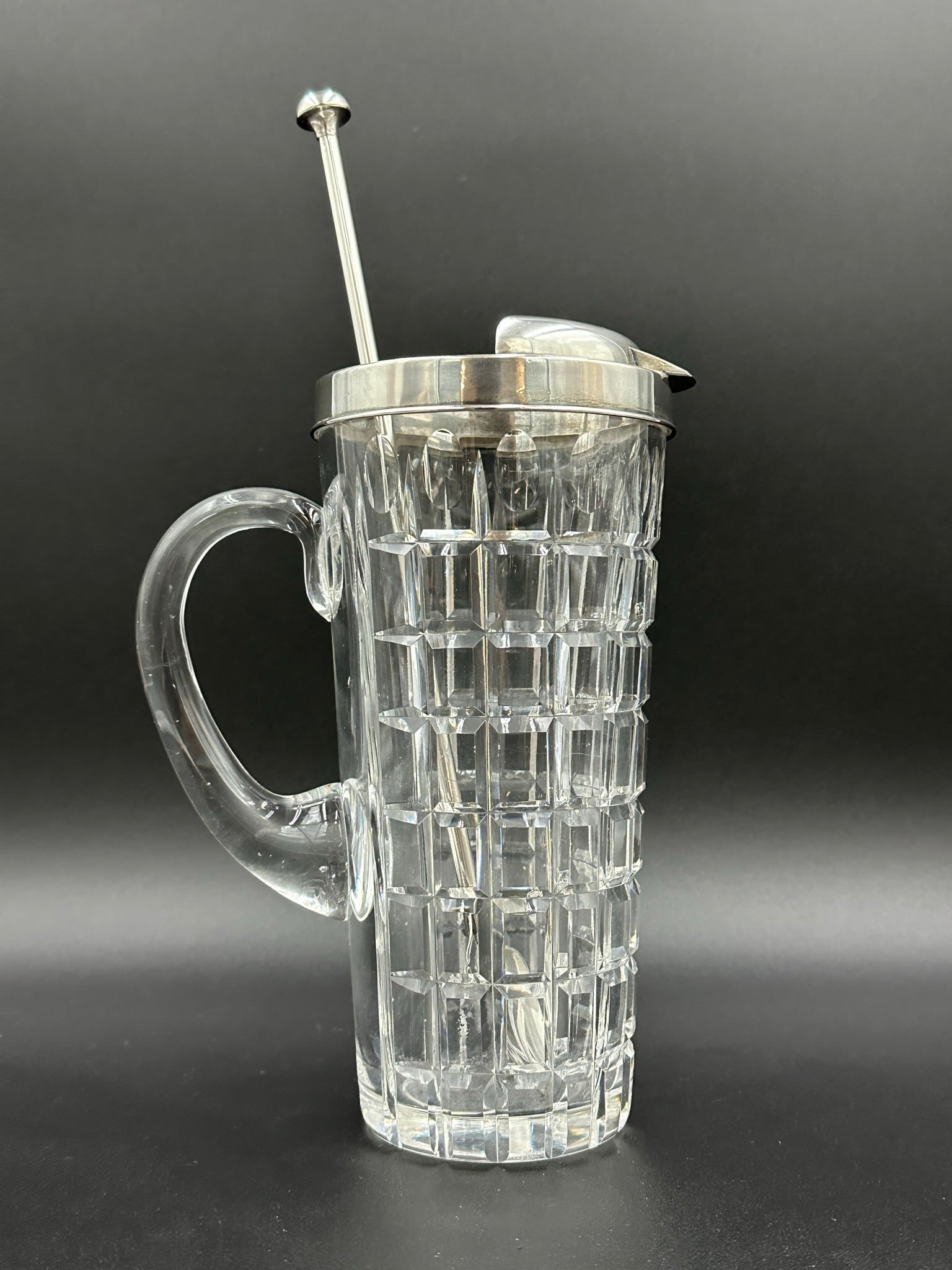 Hawkes Cut Glass & Sterling Silver Cocktail Pitcher with Spoon: Hawkes Cut Glass & Sterling Silver Cocktail Pitcher with Spoon . A Cut Glass and Sterling Silver cocktail pitcher with the spoon made by Hawkes. It is in very nice condition with no chips.