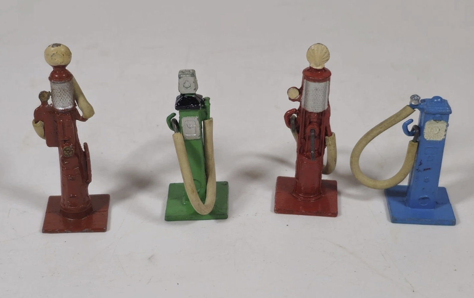 Dinky Toys Diecast Fuel Petrol Pumps set of 4 made in England: Dinky Toys Diecast Fuel Petrol Pumps set of 4 slight signs of age wear made in England