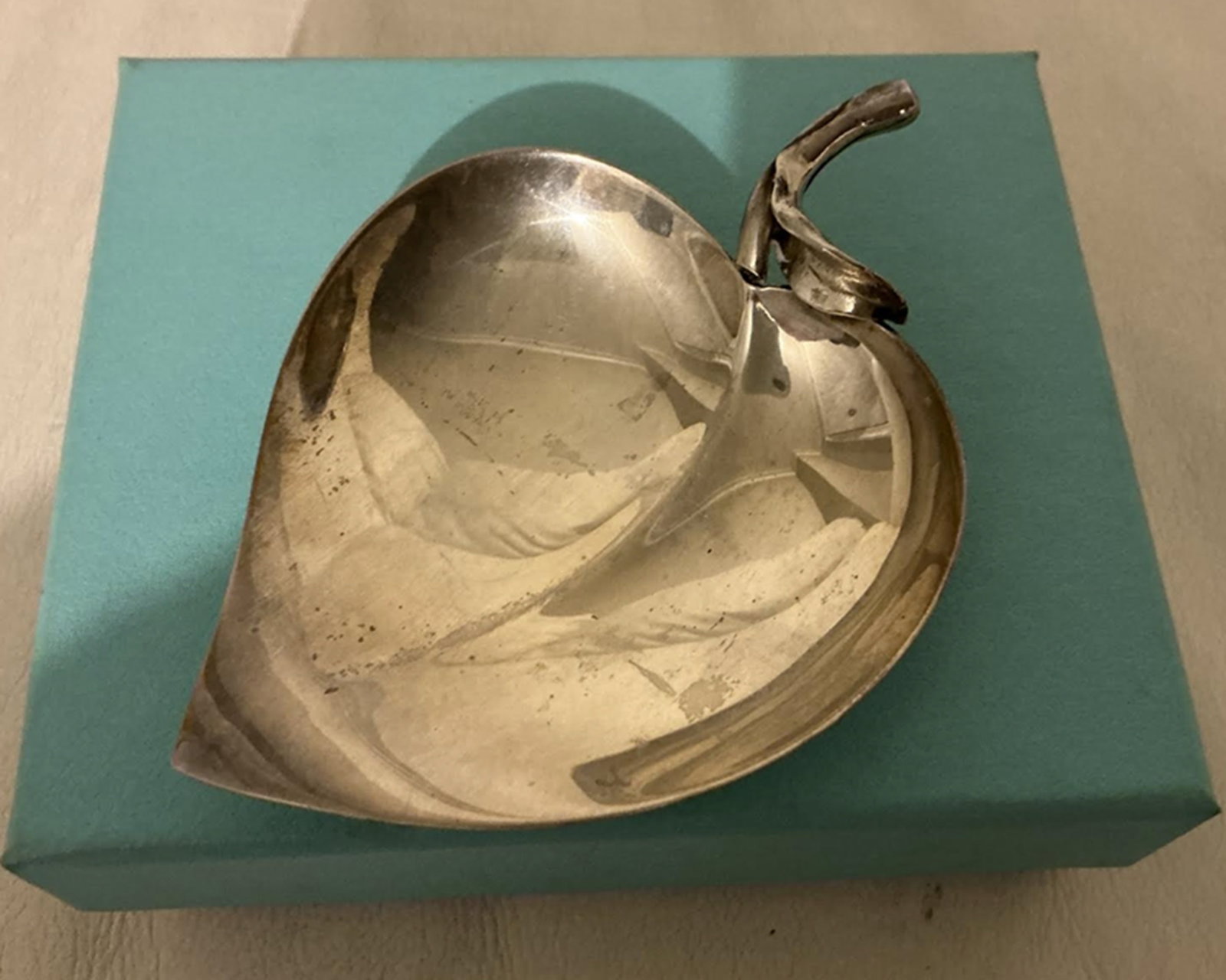 Tiffany & Co Sterling Silver Leaf Heart Dish With Box: Tiffany & Co Sterling Silver Leaf Heart Dish With Box. Measures approx 2.5 inches at its widest point and 3.5 inches Top to bottom.