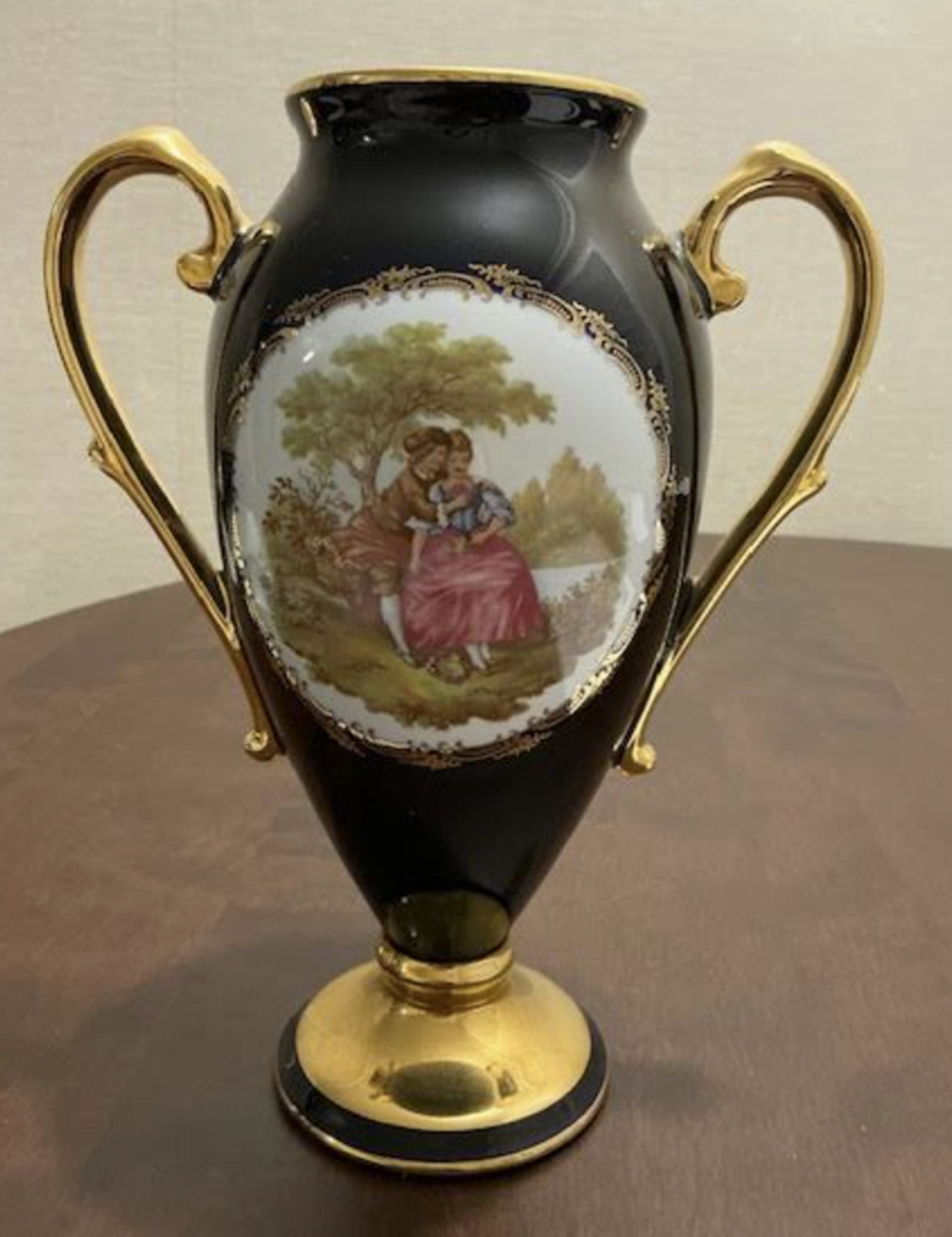 Limoges Castel France Signed Tall Porcelain Vase Urn With 22 Karat Gold accents: Limoges Castel France Signed Tall Porcelain Vase Urn With 22 Karat Gold accents. Measures approx 9 3/4 inches tall and 8 inches wide. This is a vintage Limoges Castel porcelain vase, handcrafted in Fr