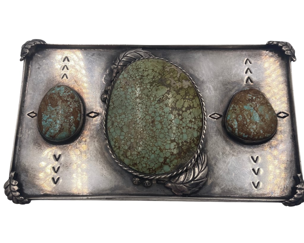 Navajo Sterling Silver Belt Buckle with Rare Green Turquoise Stones: Navajo Sterling Silver Belt Buckle with Rare Green Turquoise Stones. Navajo sterling silver belt buckle with rare natural green turquoise stones inlaid and geometric motifs. It measures approx. 4 1/2'