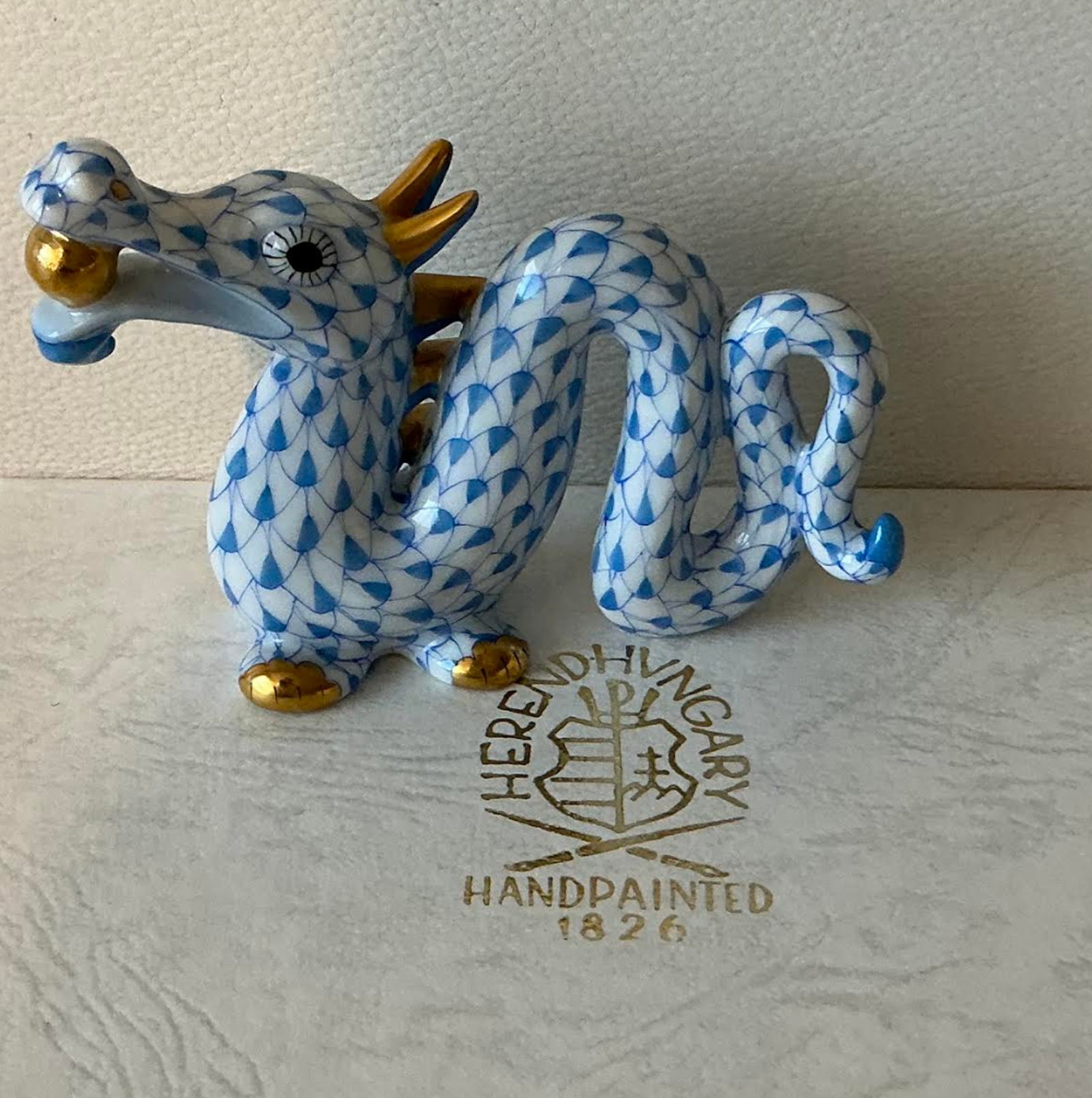 Herend Signed Porcelain Blue Fishnet Dragon Figurine with 24k Gold Accents Made in Hungary.: Herend Signed Porcelain Blue Fishnet Dragon Figurine with 24k Gold Accents Made in Hungary.. Measures approximately 5?" L x 2?" W x 2?" H. No chips or cracks present