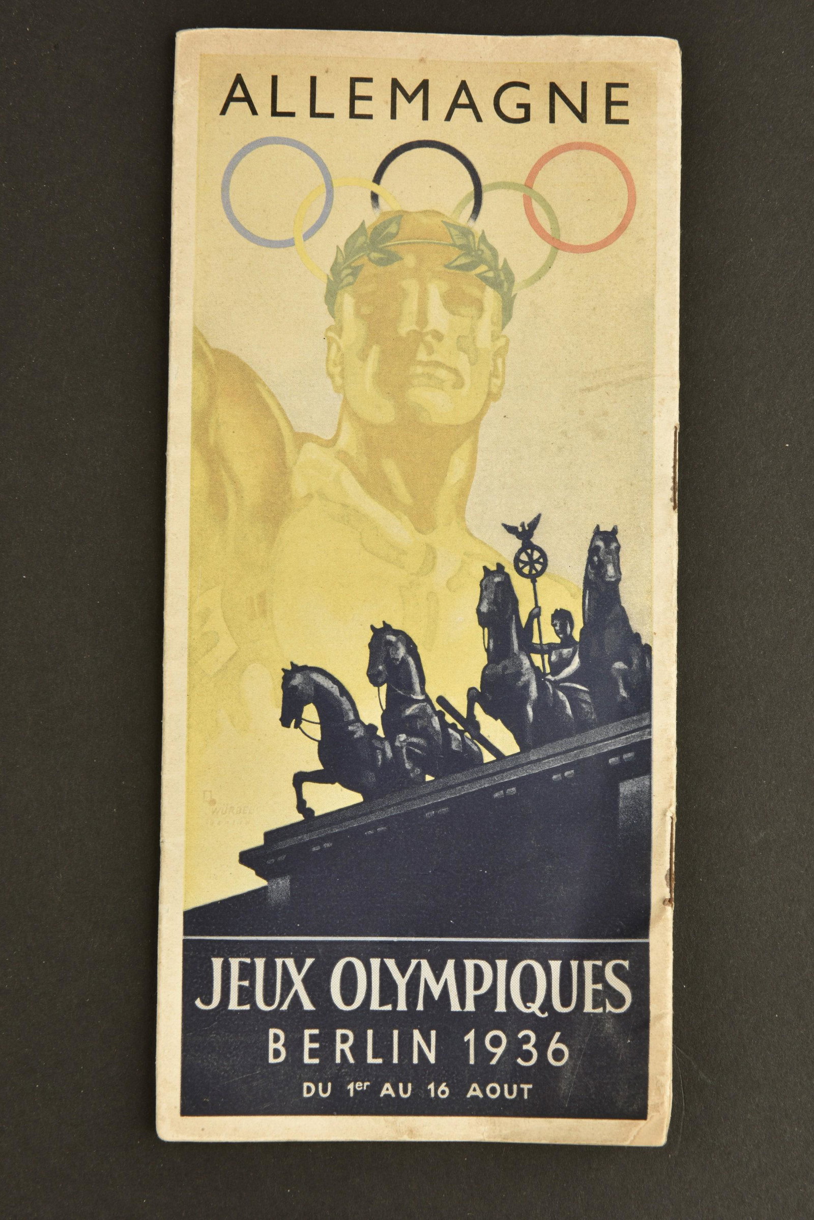 Fascicule JO 1936. Olympic games booklet 1936: Fascicule JO 1936. Complet, texte en francais. A noter une certaine usure et patine de la piece, ainsi que quelques taches. Etat II+.Fascicule JO 1936. Complete, text in French. Note some wear and pat