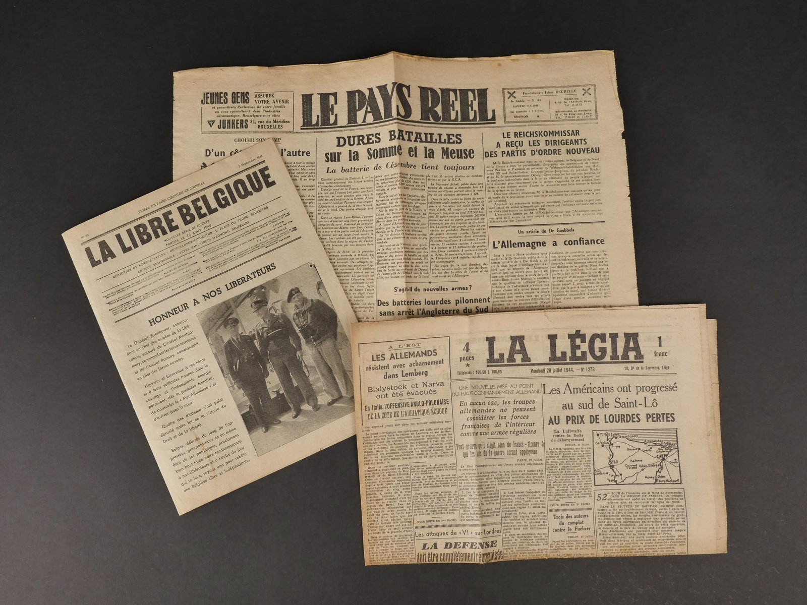 Le Pays Reel. The Real Country.: Le Pays Reel. Exemplaire original du 2 septembre 1944, complet. On y joint un exemplaire de La Legia du 28 juillet 1944. Taches, manques, pliures et salissures. Le Pays Reel, Original copy of Septembe