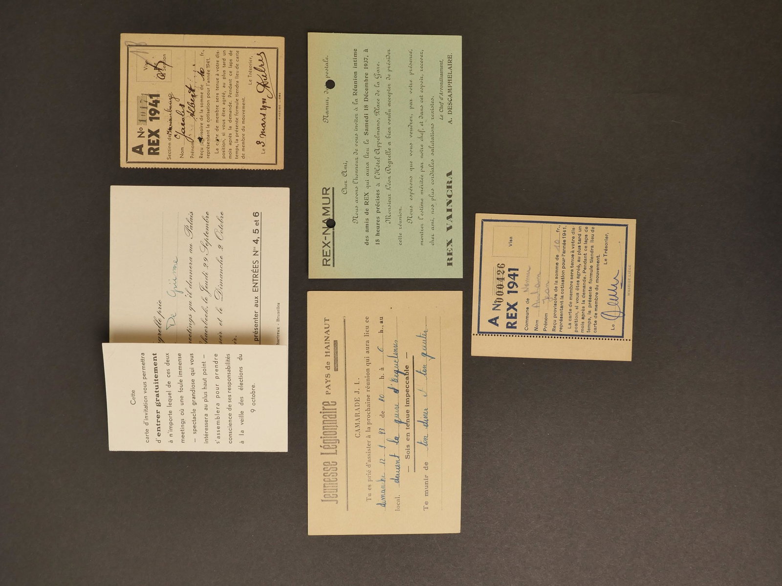 Cartes de formations de Rex. Maps of Rex formations.: Carte de formation de Rex comportant une invitation de la Jeunesse Legionnaire, une carte dâ€™invitation pour les membres de Rex de Namur comportant deux trous de perforations de classement, une 
