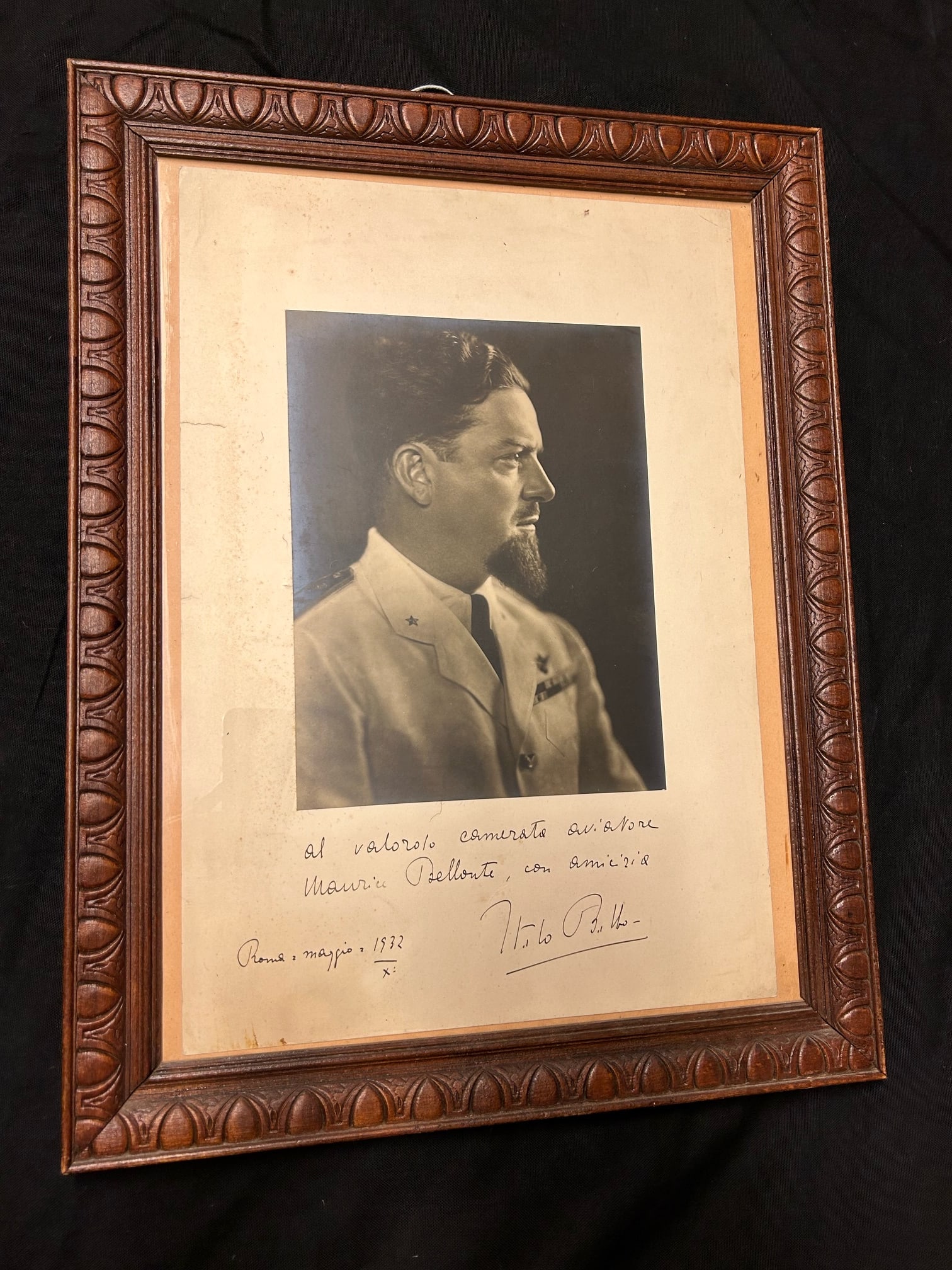 Photo dedicacee de Italo Balbo. Signed photo of Italo Balbo.: Photo dedicacee de Italo Balbo. A l’illustre pilote Maurice Bellonte en mai 1932. Rare souvenir de deux aviateurs de legende. Piece encadree, dimensions 57x44,5 cm. Etat-. Dedicated photo of Italo B