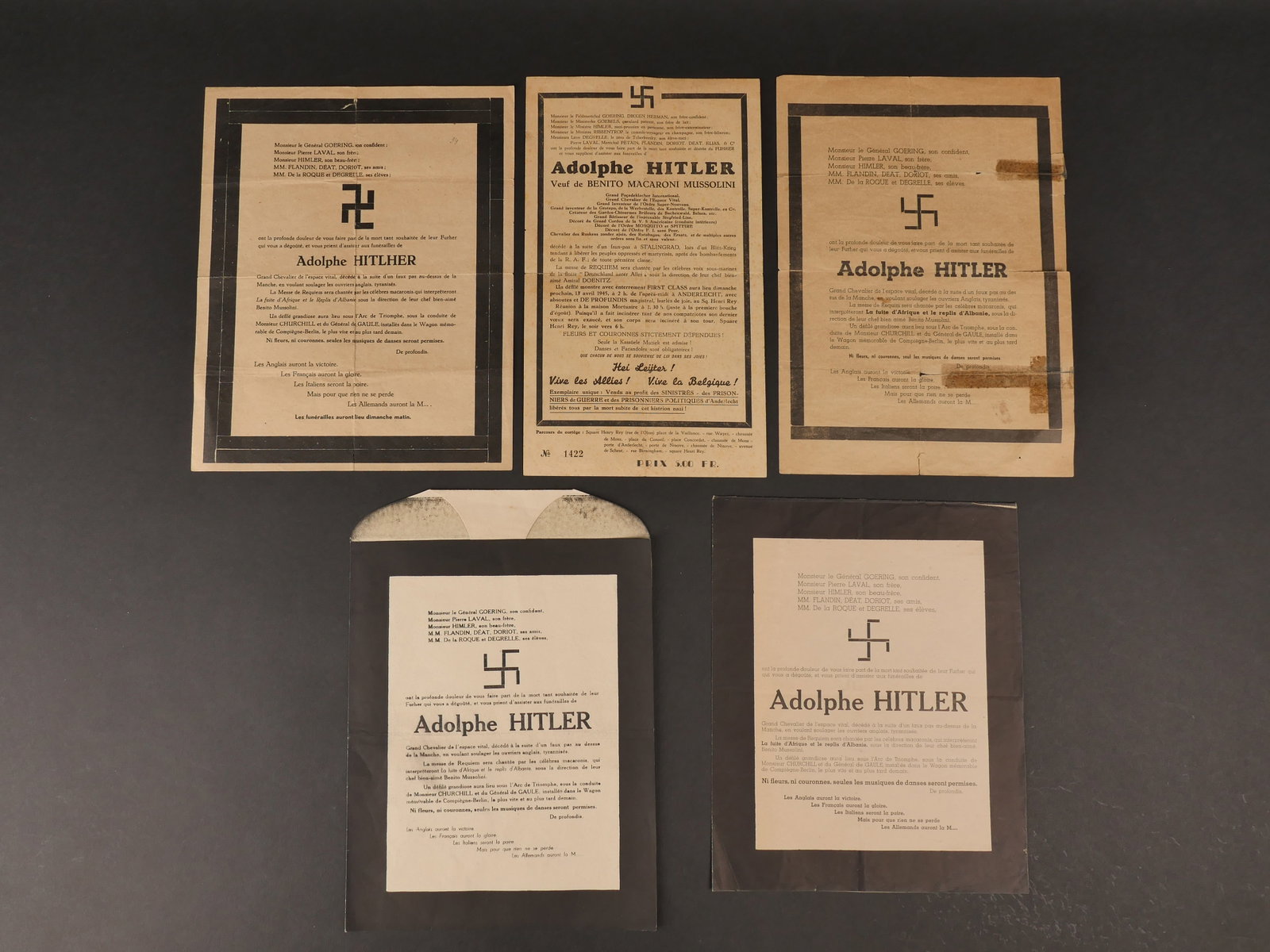 faire-part de deces satiriques annoncant la mort de Hitler et de Rex. satirical death notices: Cinq faire-part de deces satiriques annoncant la mort de Hitler et de Rex. Comprenant 4 exemplaires differents sur la mort de Hitler et un annoncant celle de Hitler et au dos celle de Rex victime d’