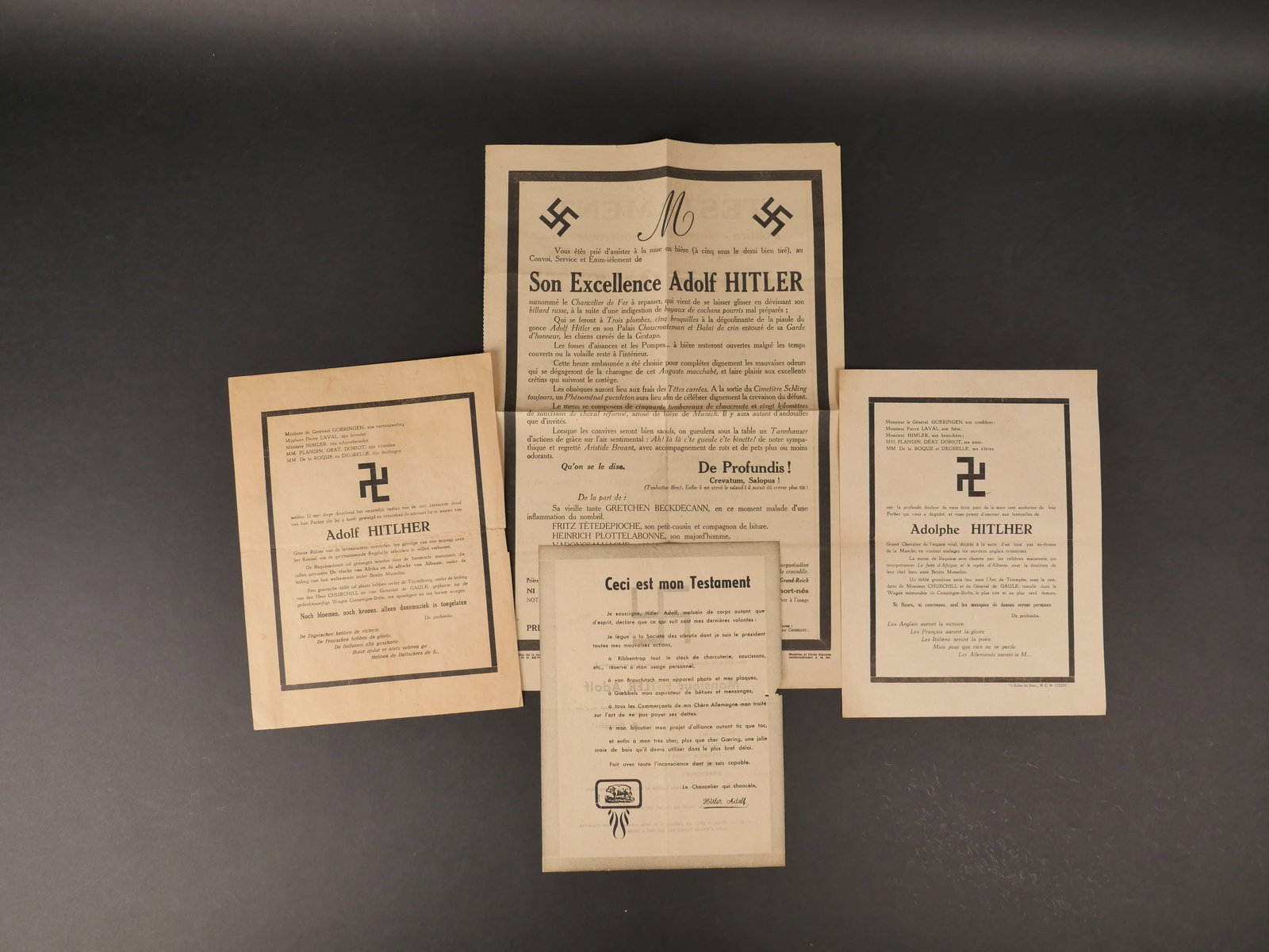 4 faire-part de deces satiriques annoncant la mort de Hitler et de Rex. 4 satirical death notices: 4 faire-part de deces satiriques annoncant la mort de Hitler et de Rex. Comprenant un rare modele affichette biface, format 28x44, 3 exemplaires dont deux similaires. Manques, pliures, salissures. 4 s