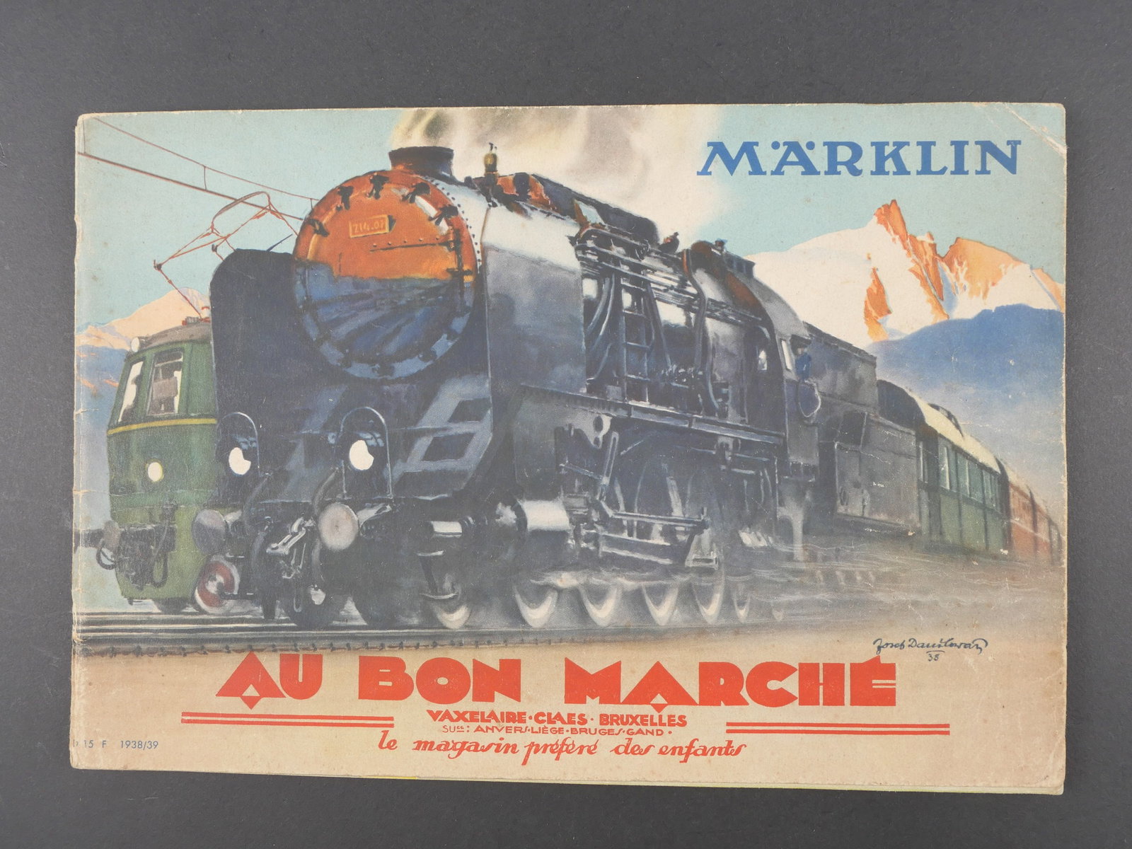 Catalogue Marklin. Marklin catalog.: Catalogue Marklin. Texte en francais, dessin en couleur. Marquages Au bon Marche Vaxelaire Claes Bruxelles. Date 1939/1939. A noter une certaine usure et patine de la piece. Etat II+. Marklin Catalogu